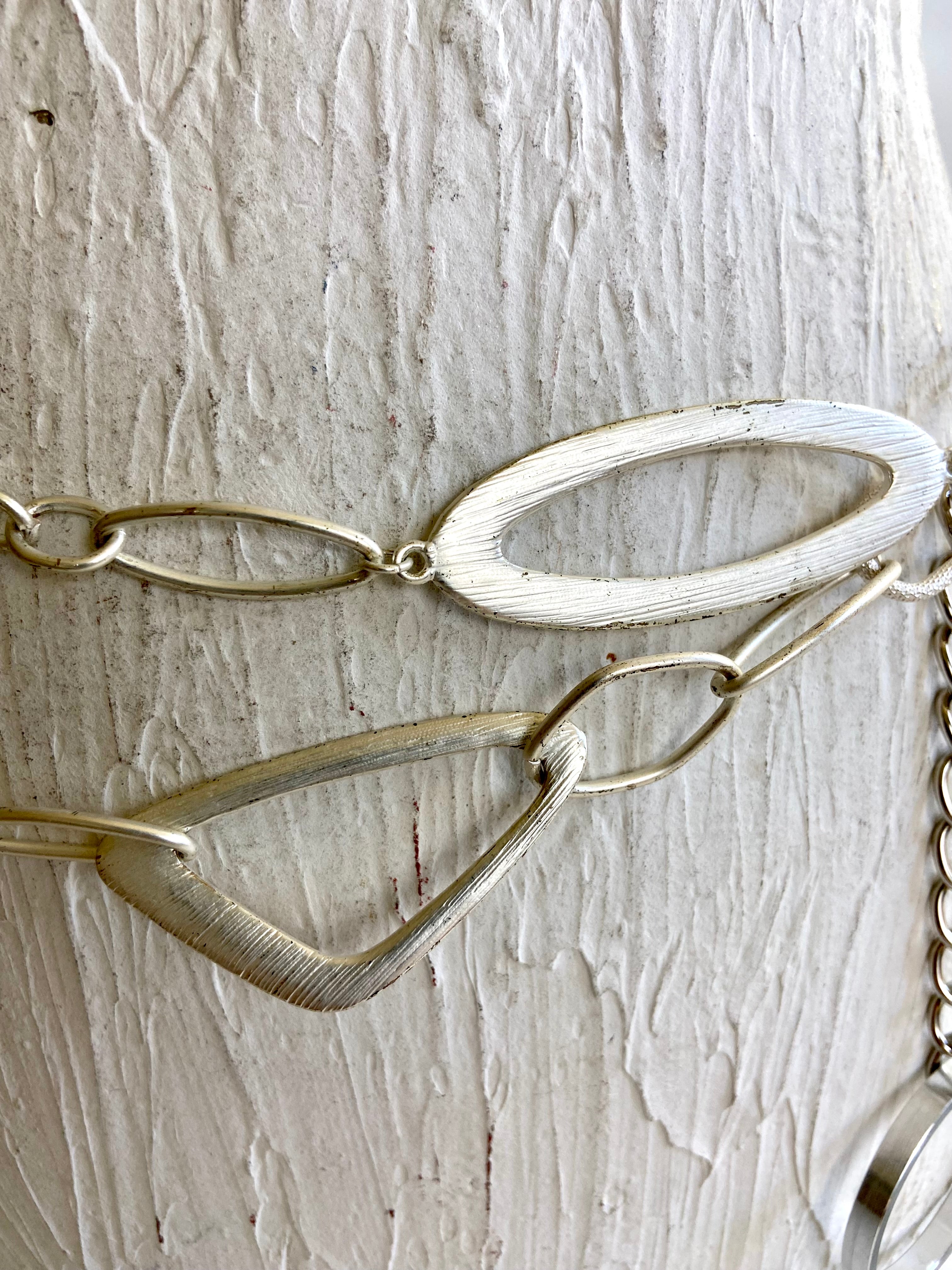 Silver tone belt