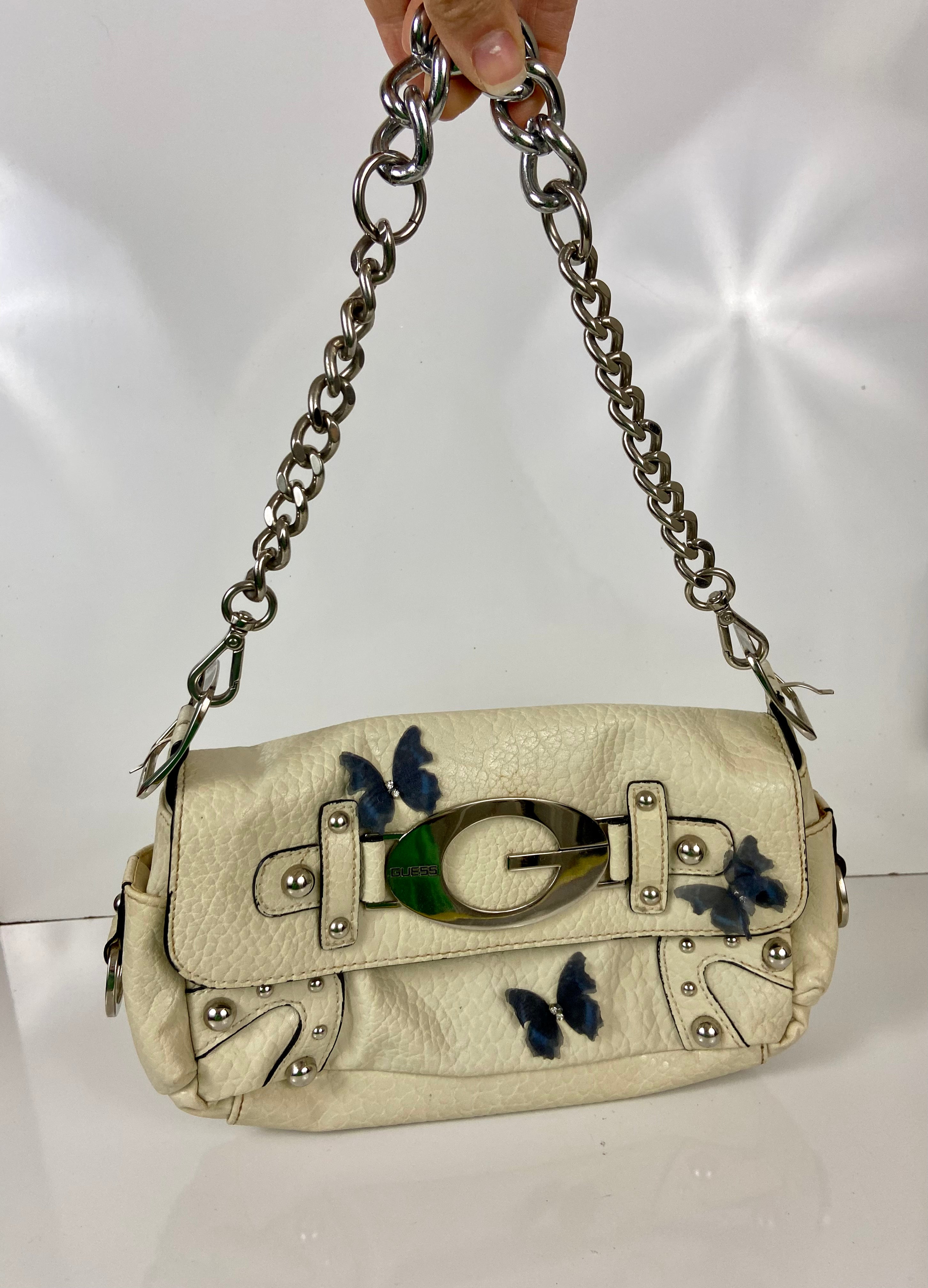 Reworked Vintage Y2k
Guess Studded Shoulder Bag with butterfly 🦋