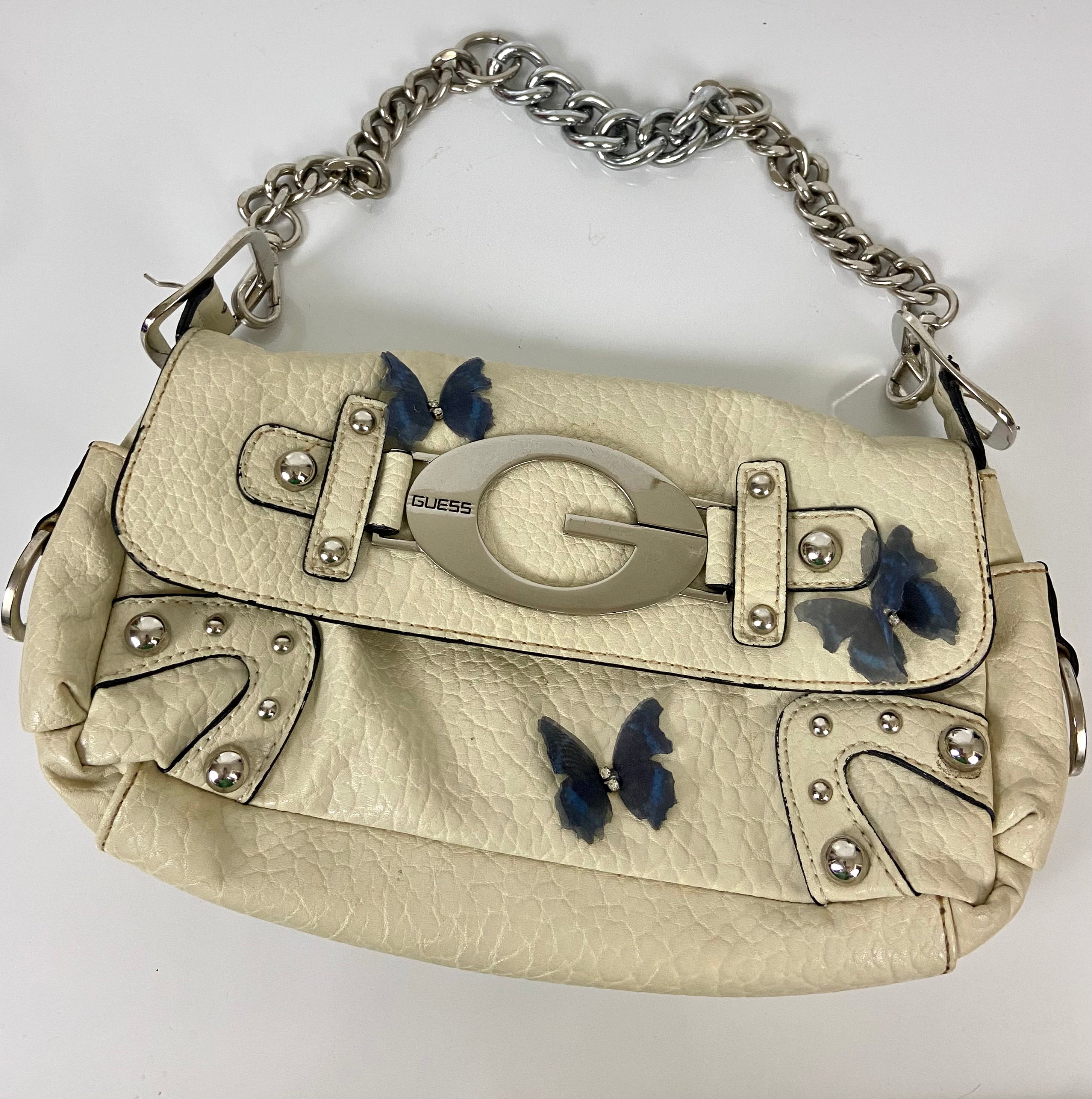Reworked Vintage Y2k
Guess Studded Shoulder Bag with butterfly 🦋