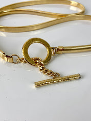 Trapped gold circle belt