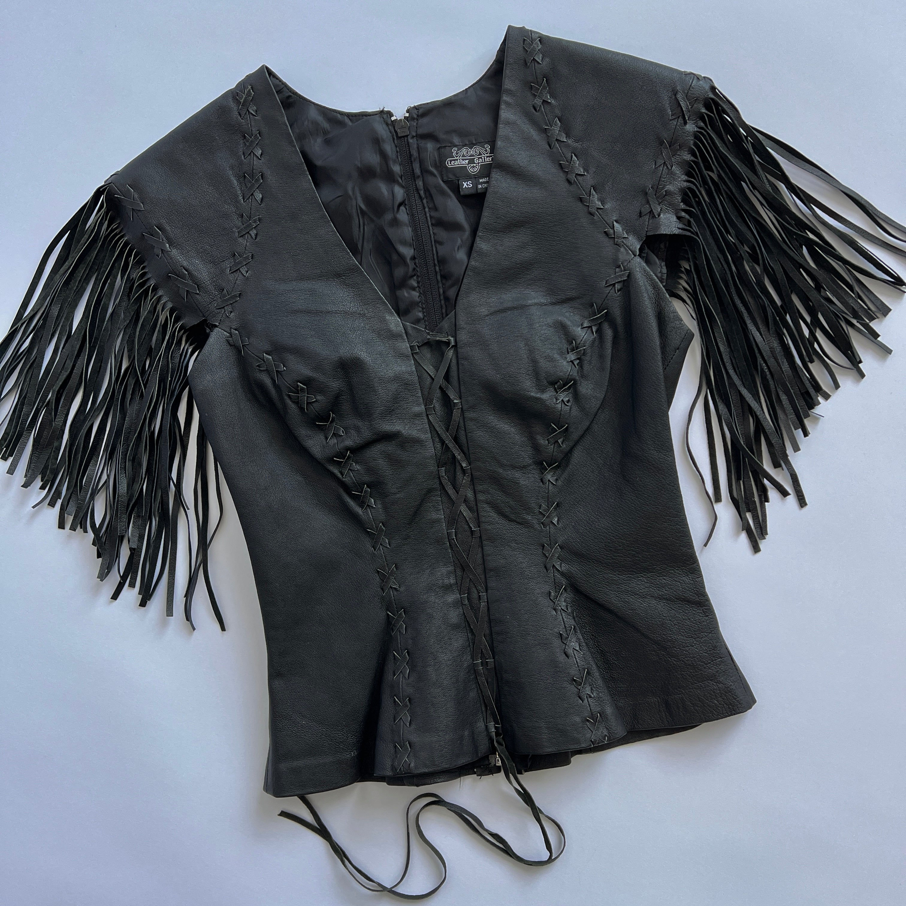 black leather stitch & fringe top