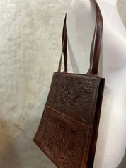Leaders. In leather bag or backpack