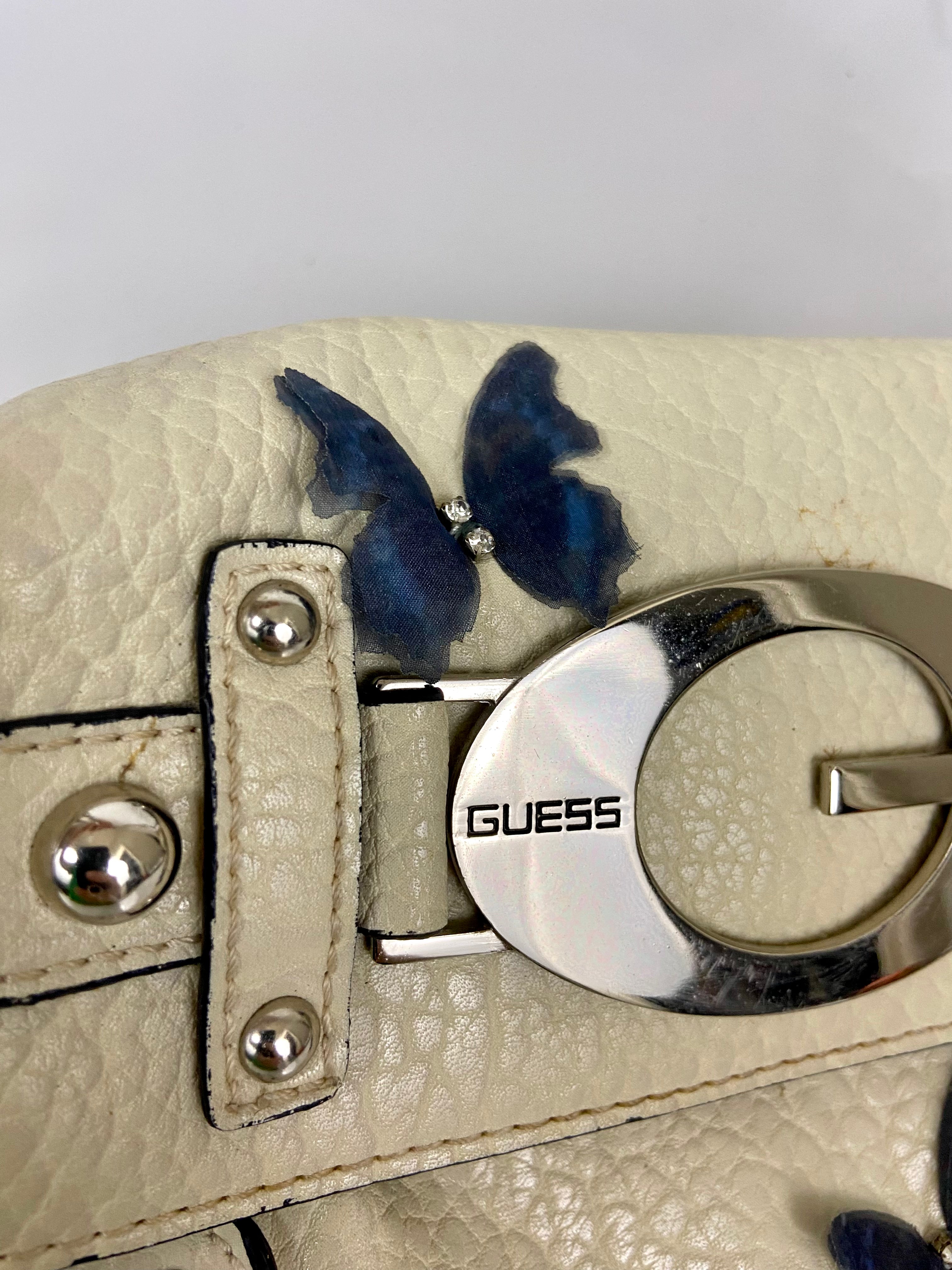 Reworked Vintage Y2k
Guess Studded Shoulder Bag with butterfly 🦋