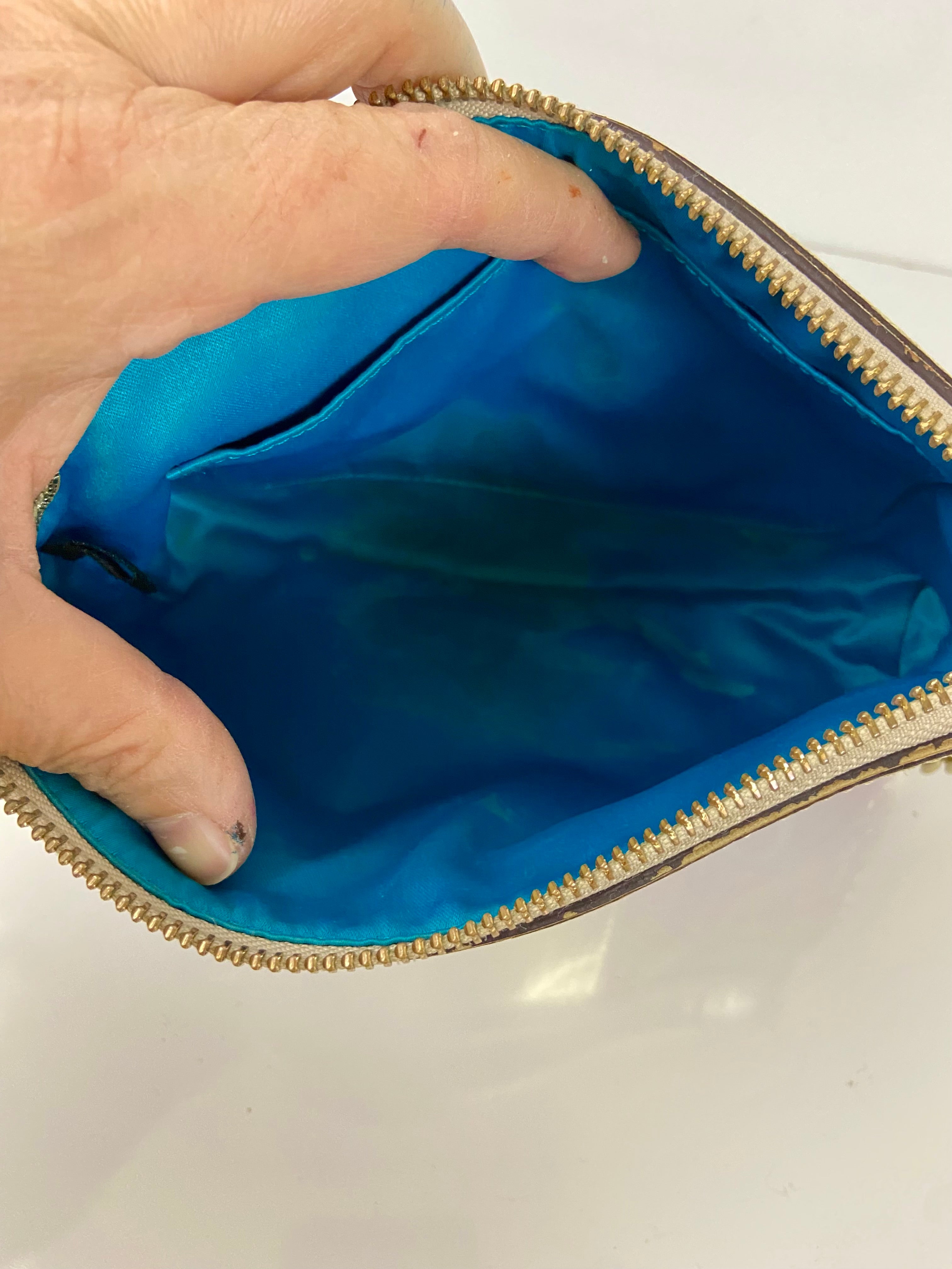 Coach with reworked gold metal handles