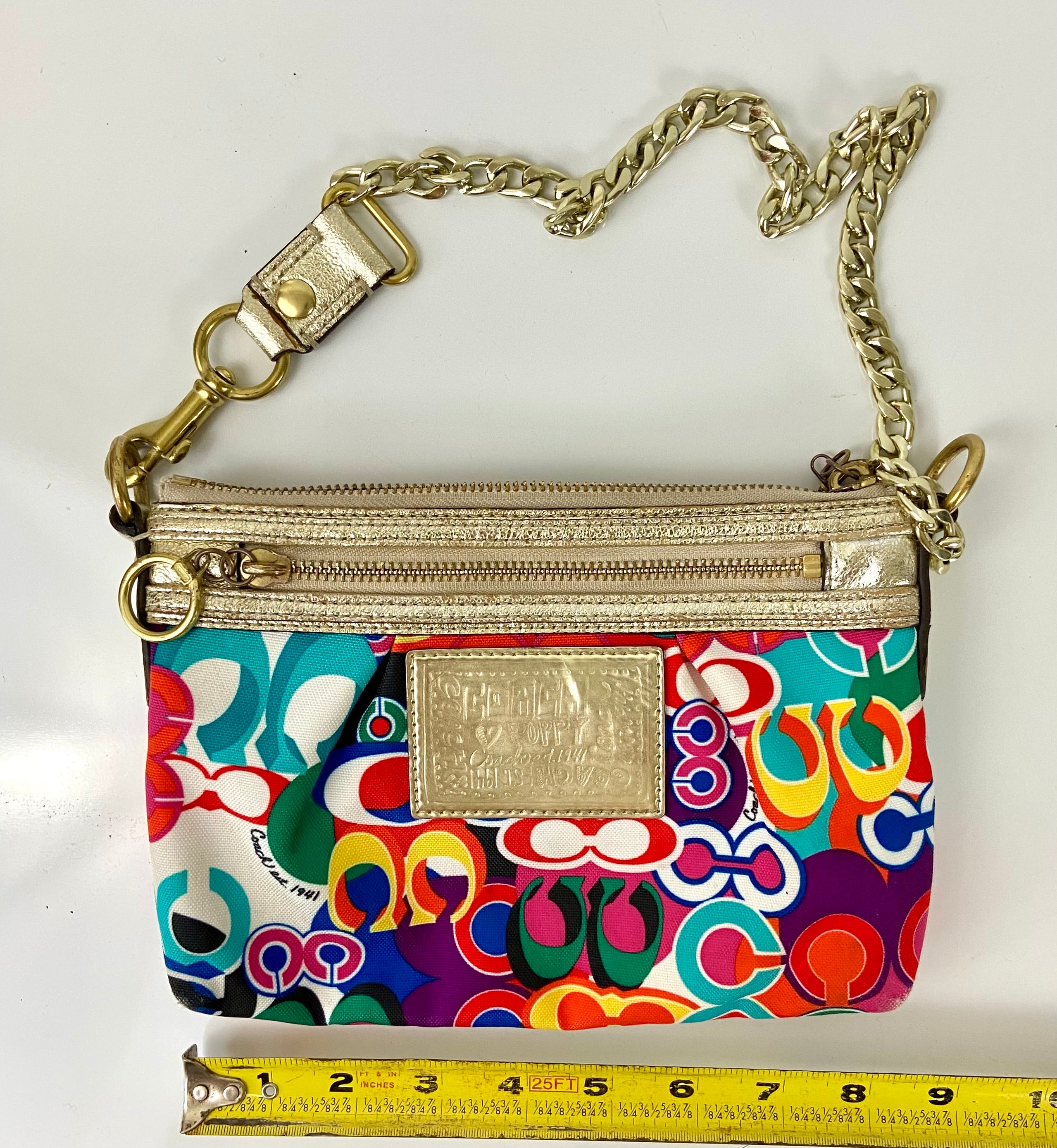Coach with reworked gold metal handles