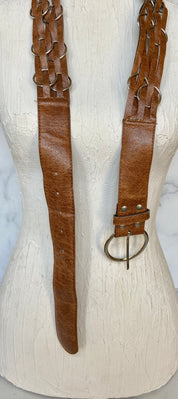 Brown leather belt with metal circle