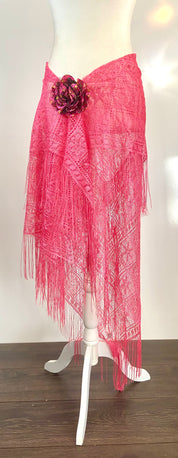 Hot pink poncho with flower accessories