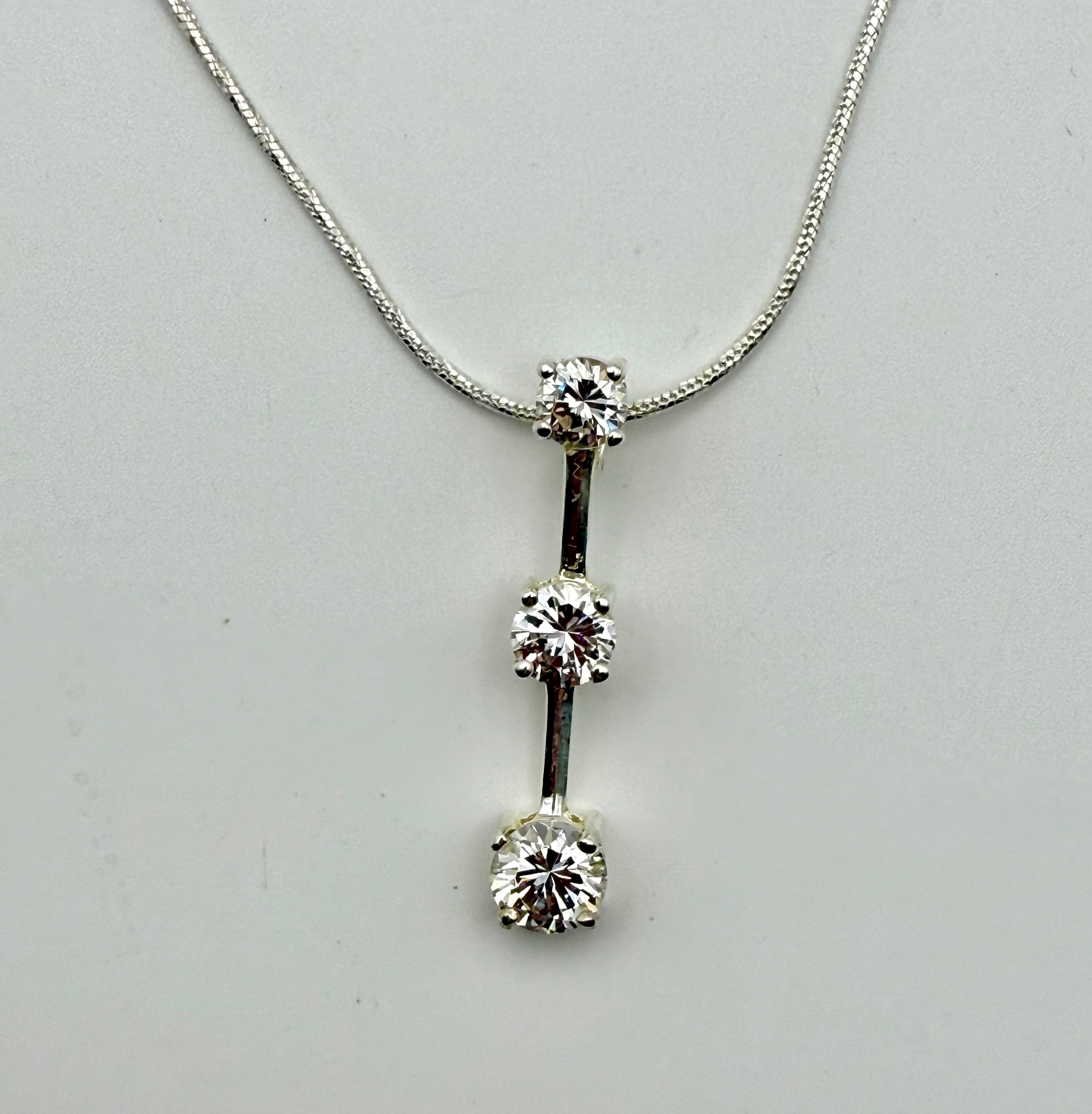 Three
Diamond Pendant necklace