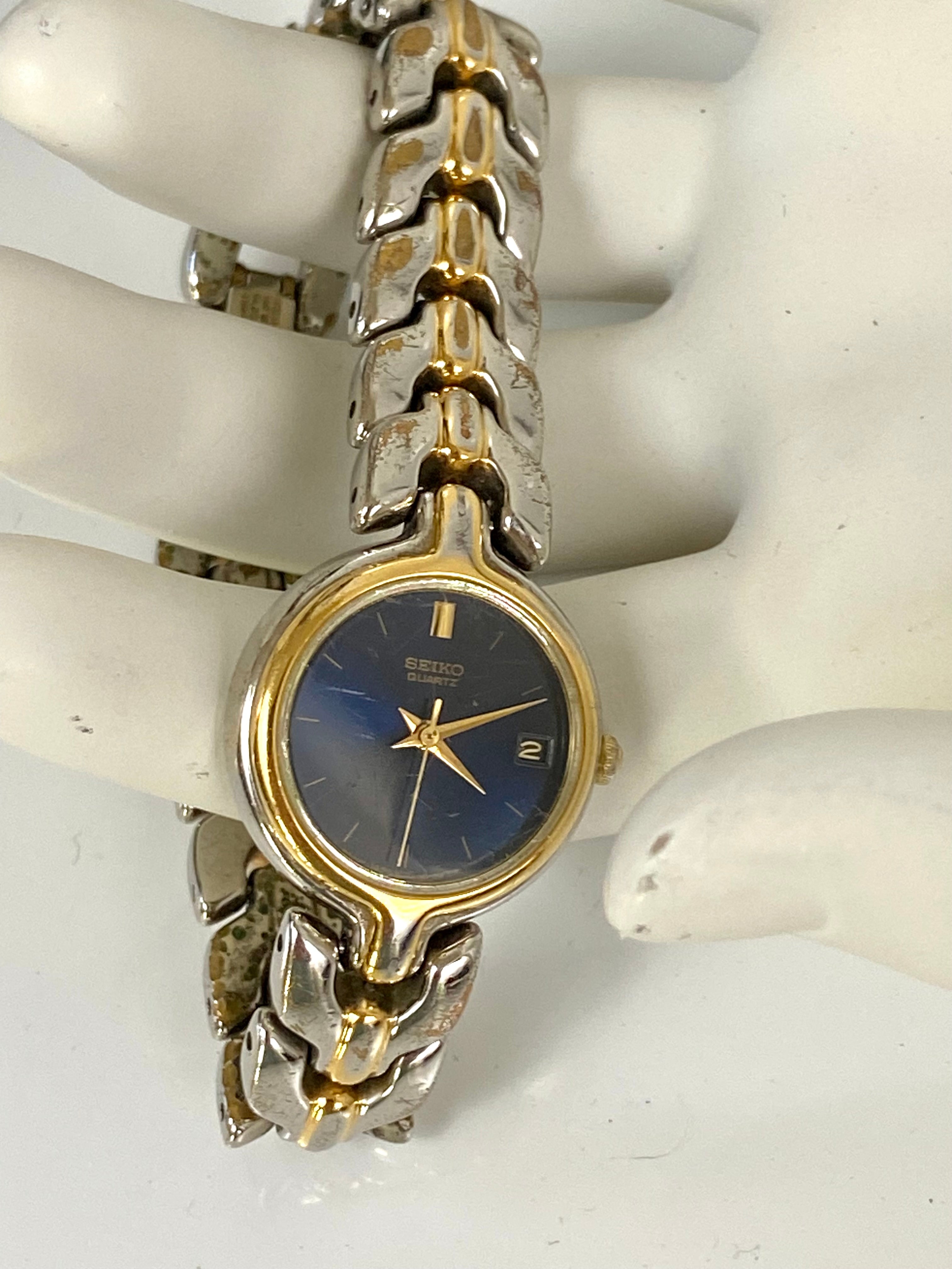 Gold and Silver Watch ⏱️