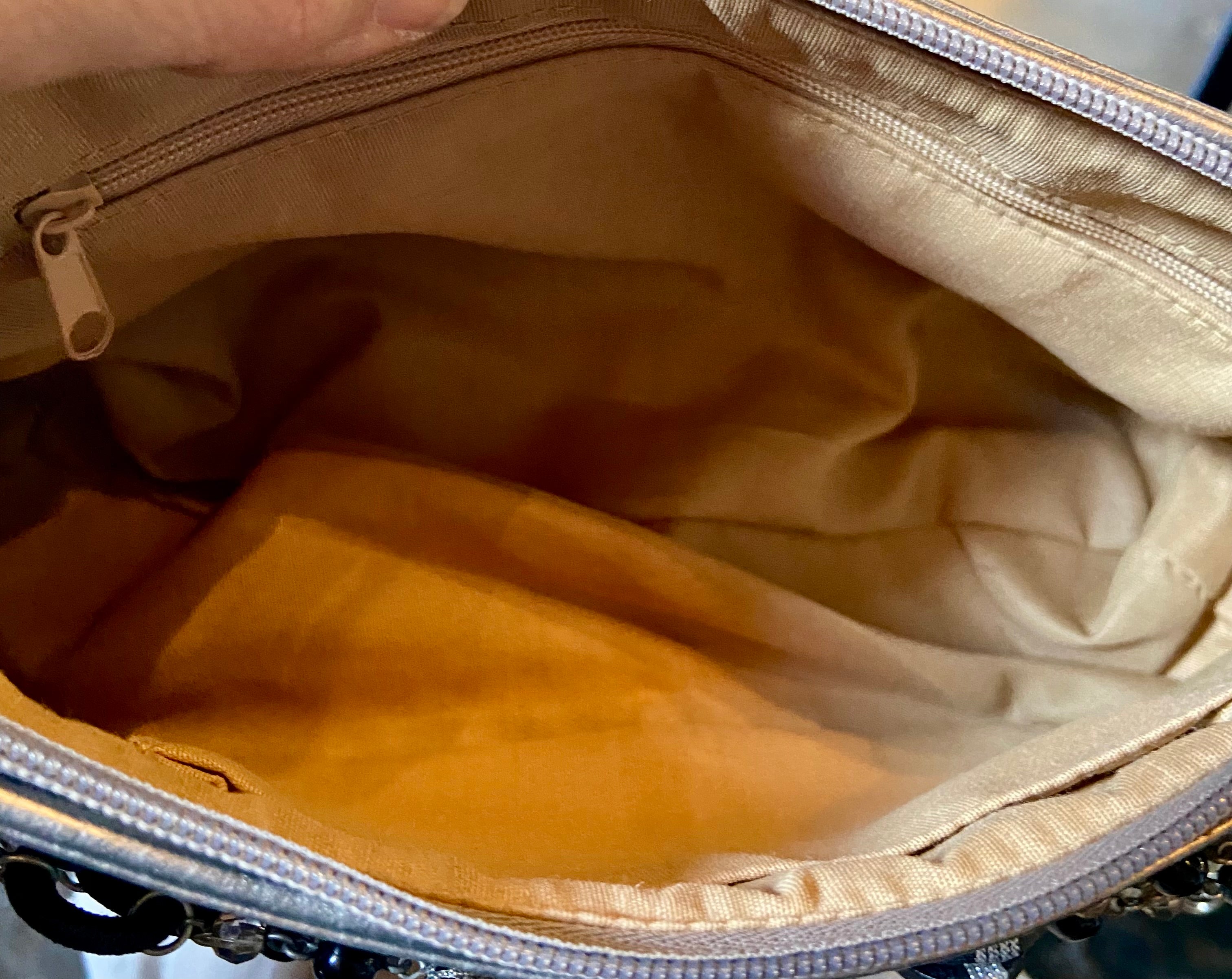 Reworked silver purse