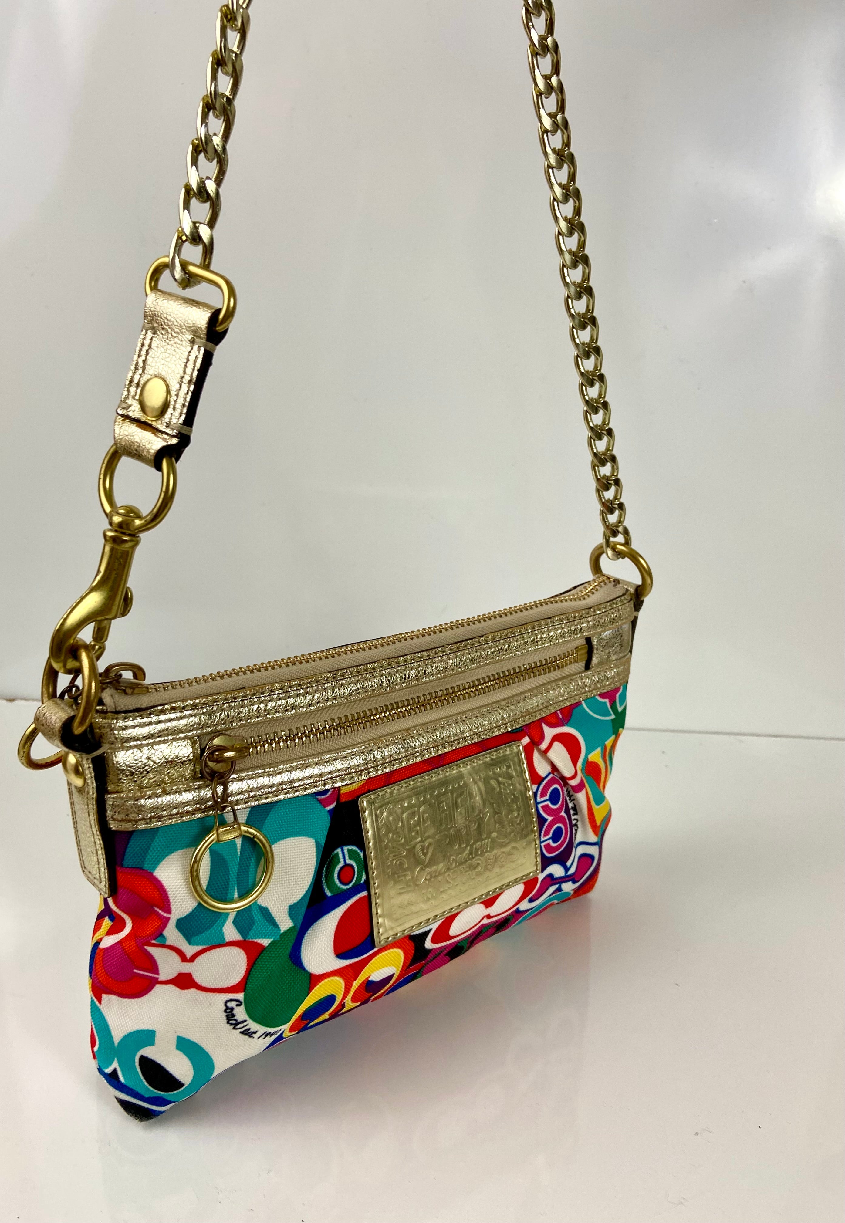 Coach with reworked gold metal handles
