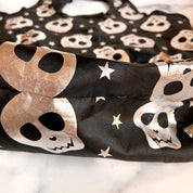 Silver and black skull bag