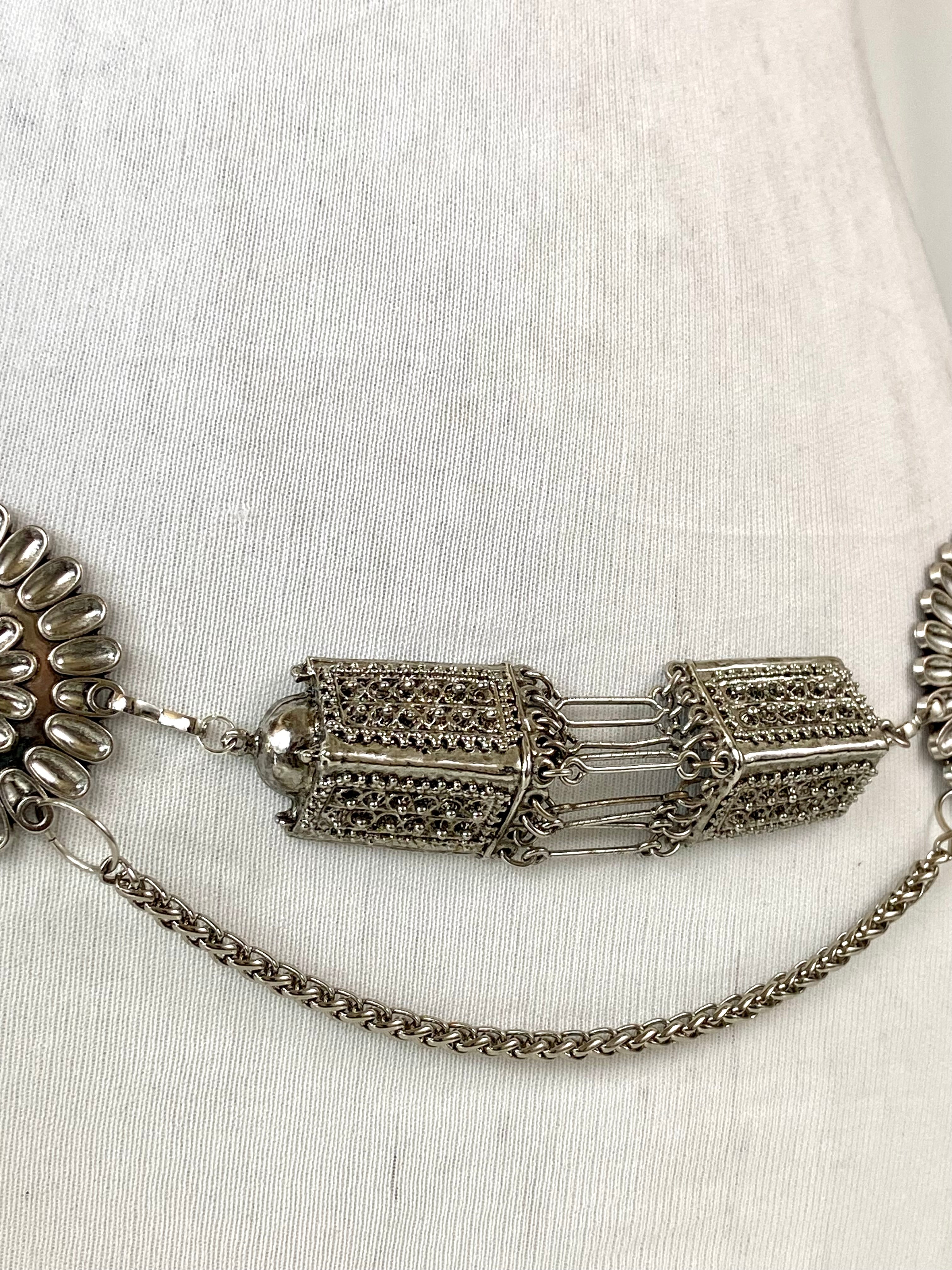 Silver red tone waist belt