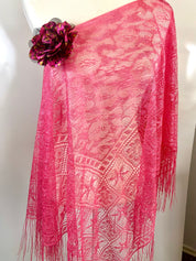 Hot pink poncho with flower accessories