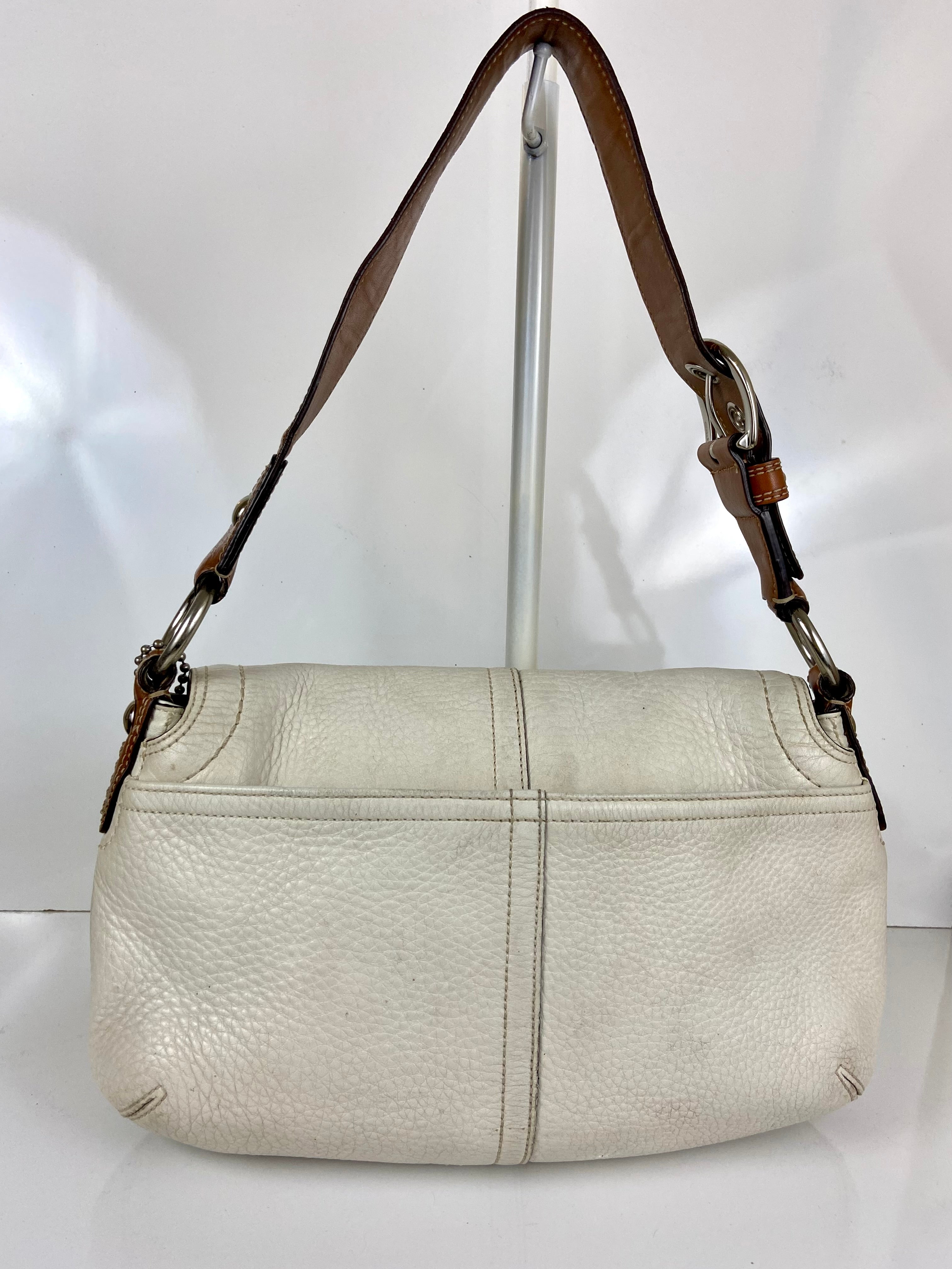 Coach Hampton Soho Satchel
Purse Ivory Saddle Leather F10192
Buckle Handbag