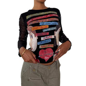 Misia Paris French vintage Y2K black illustrated graphic top with French poetry print & sheer doodle mesh sleeves