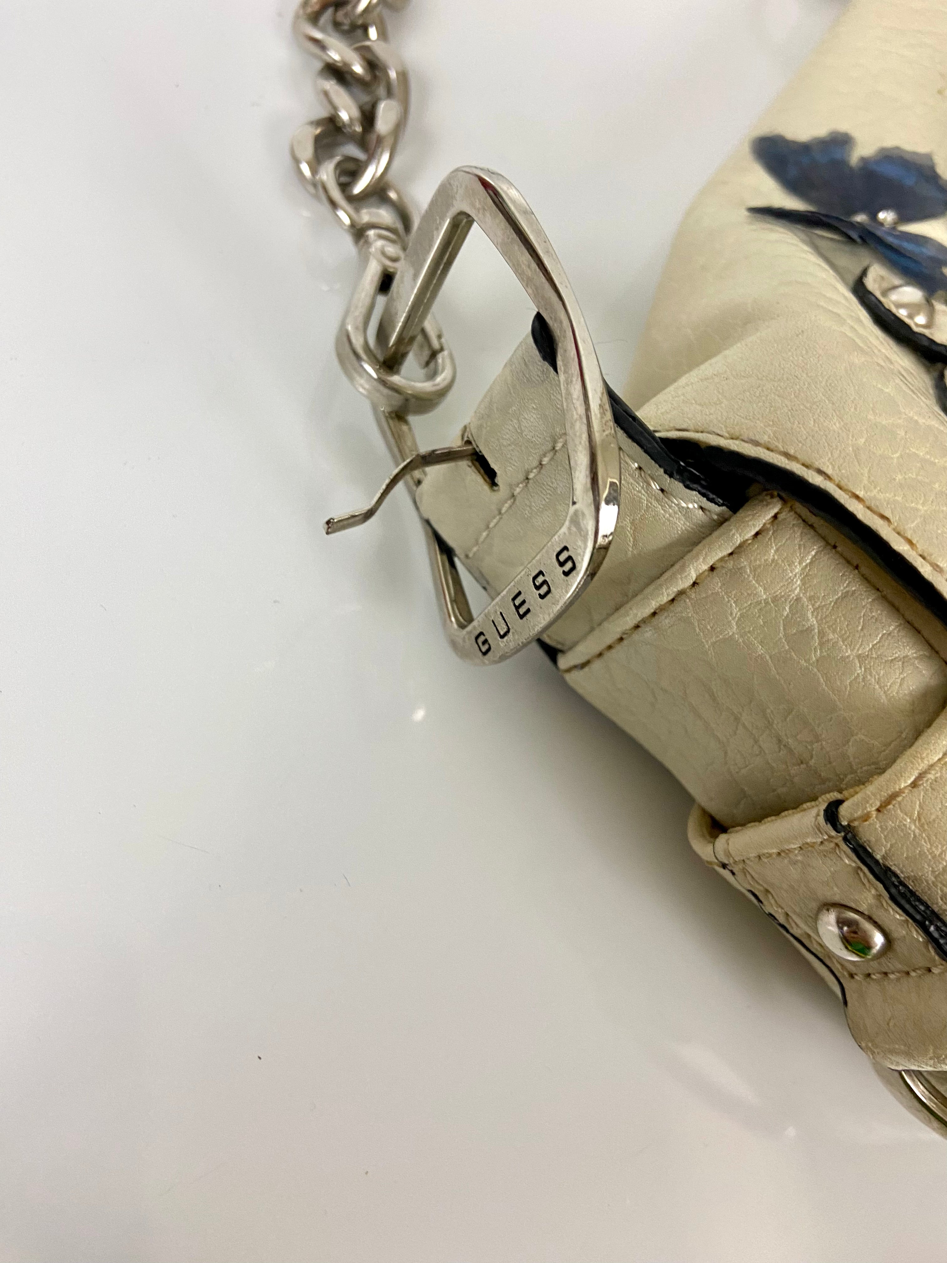 Reworked Vintage Y2k
Guess Studded Shoulder Bag with butterfly 🦋