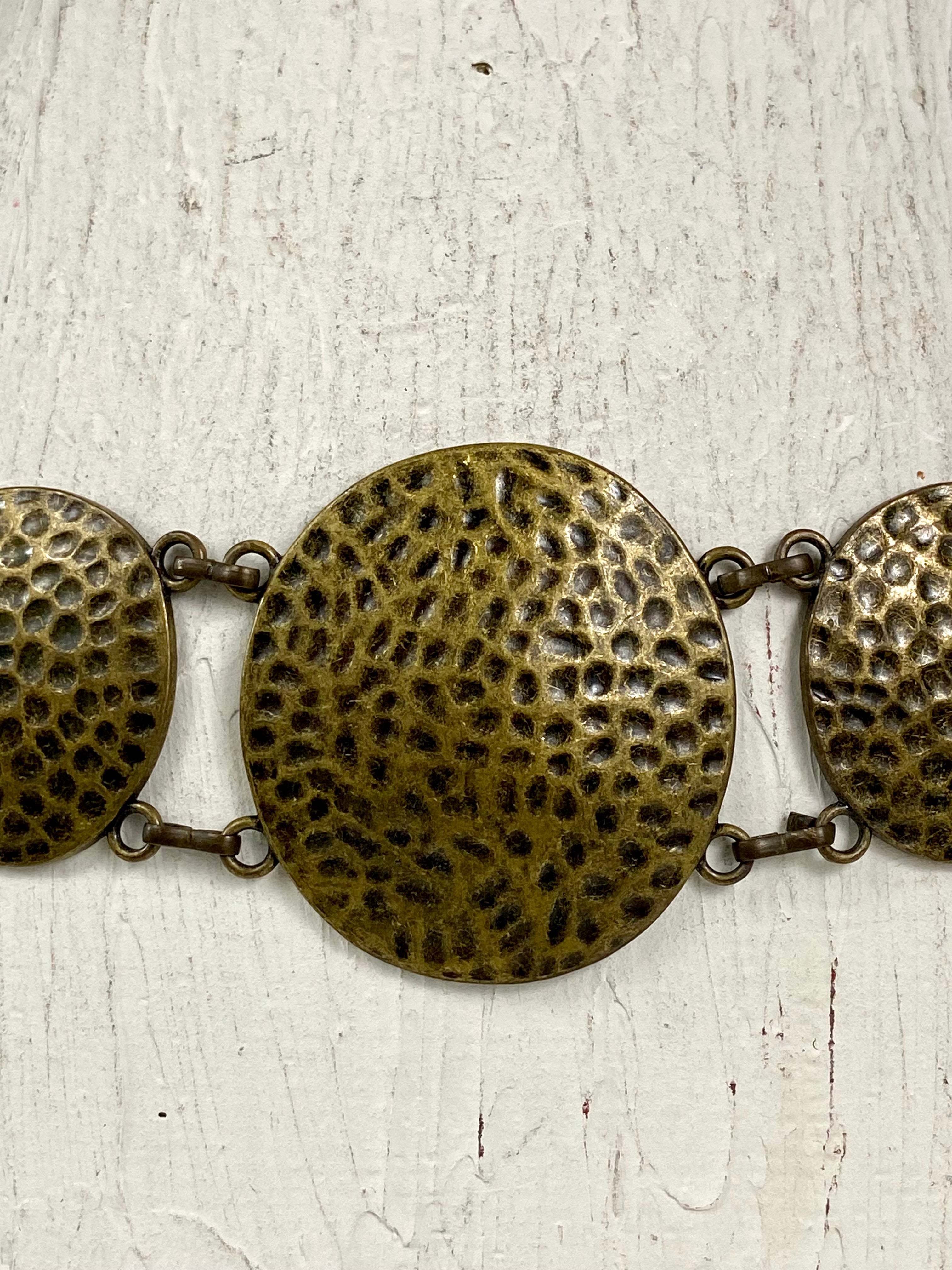 Bronze hammered circle belt