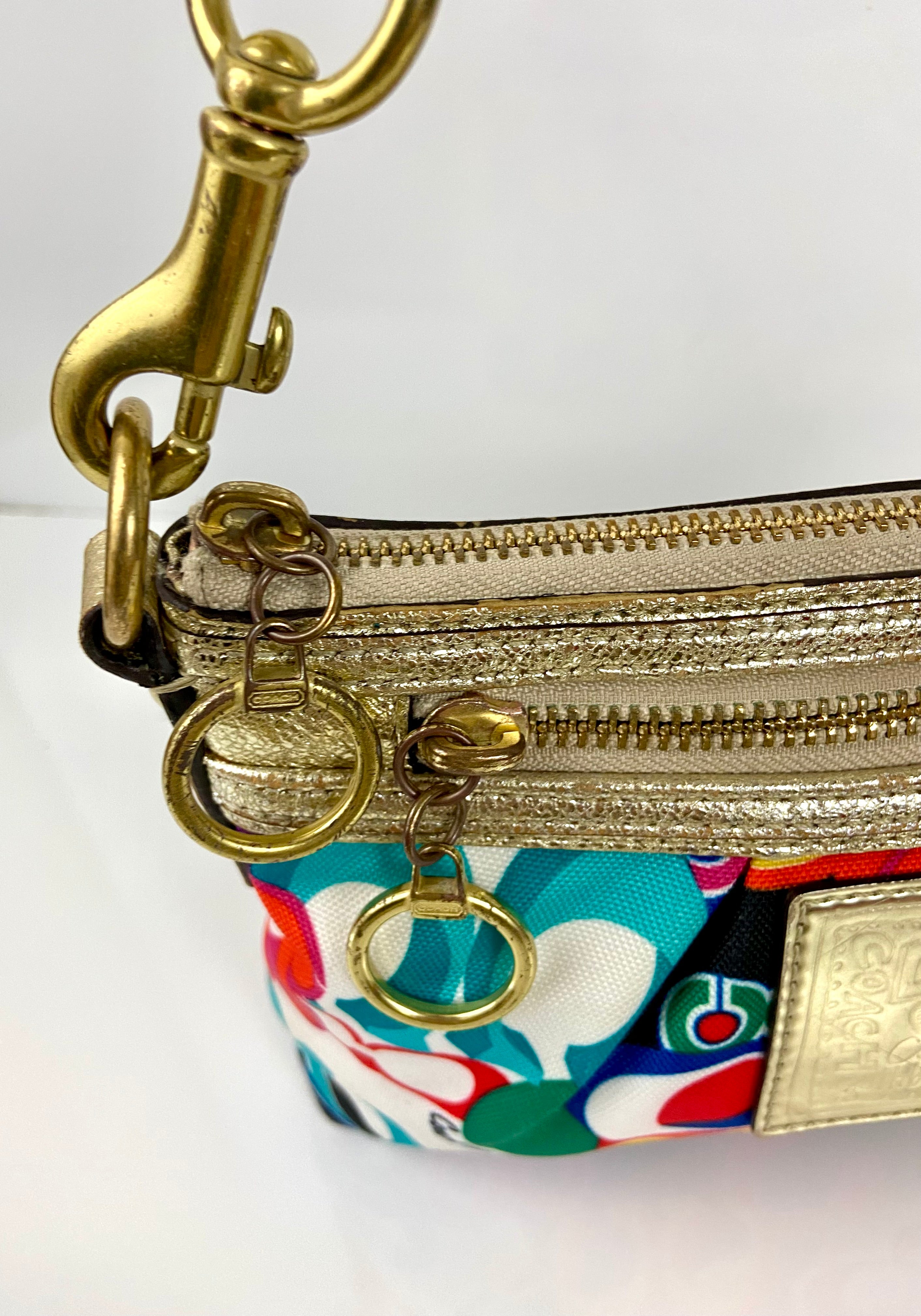 Coach with reworked gold metal handles