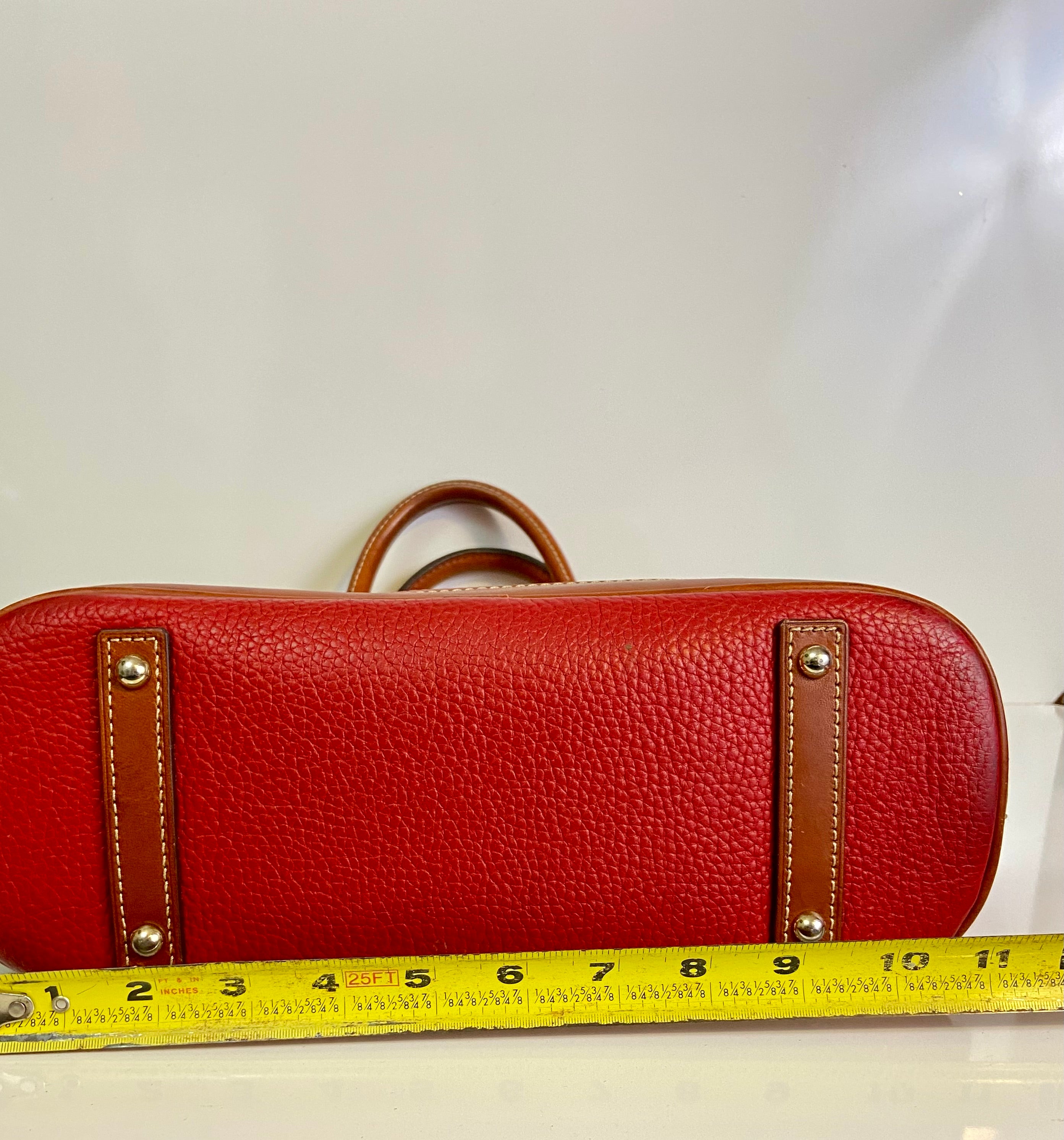 Dooney and Bourke Red and brown
Pebble Leather Zip Top Satchel