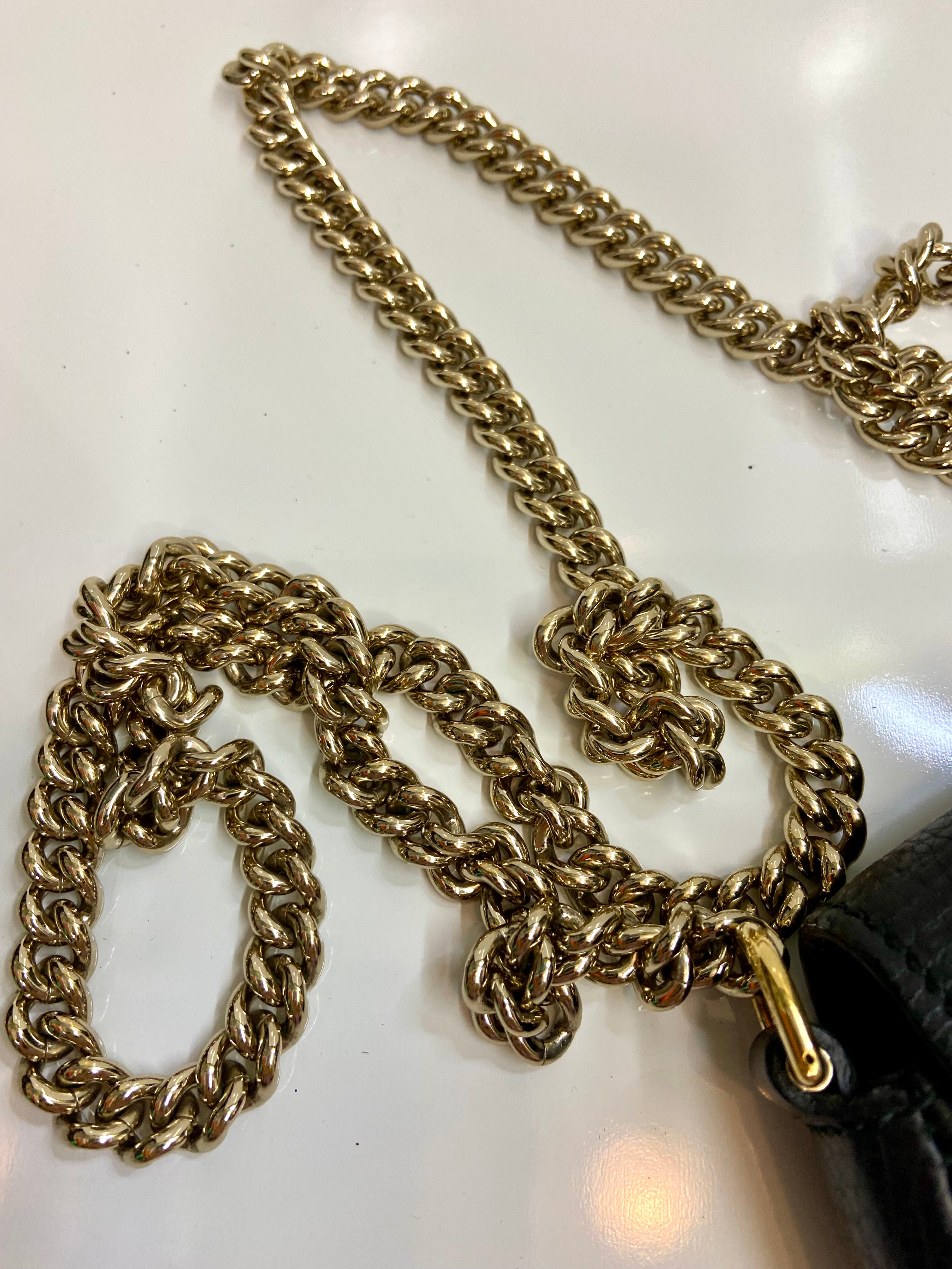 GUCCI Pebbled Calfskin
Small Soho Flap Crossbody