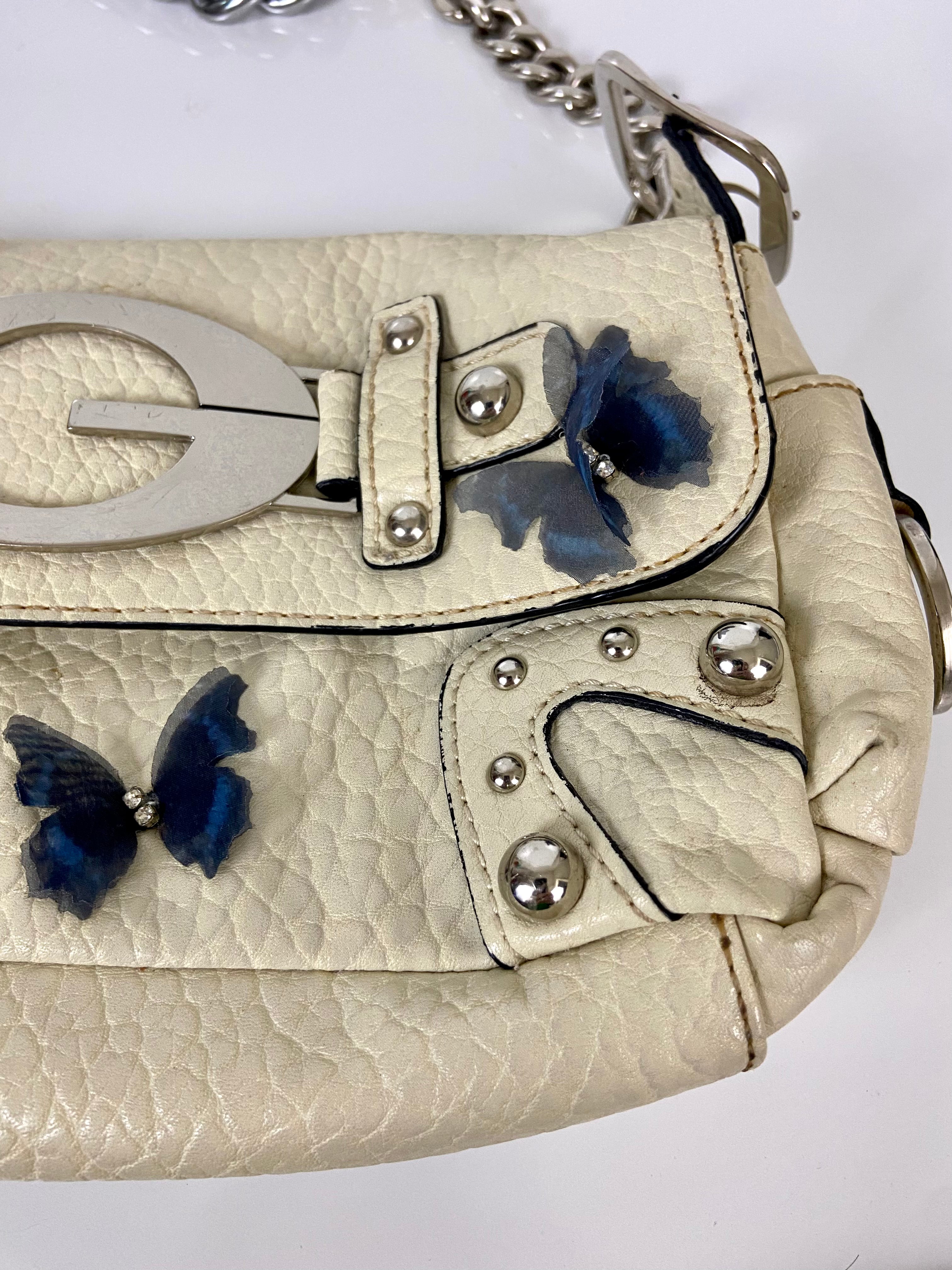 Reworked Vintage Y2k
Guess Studded Shoulder Bag with butterfly 🦋