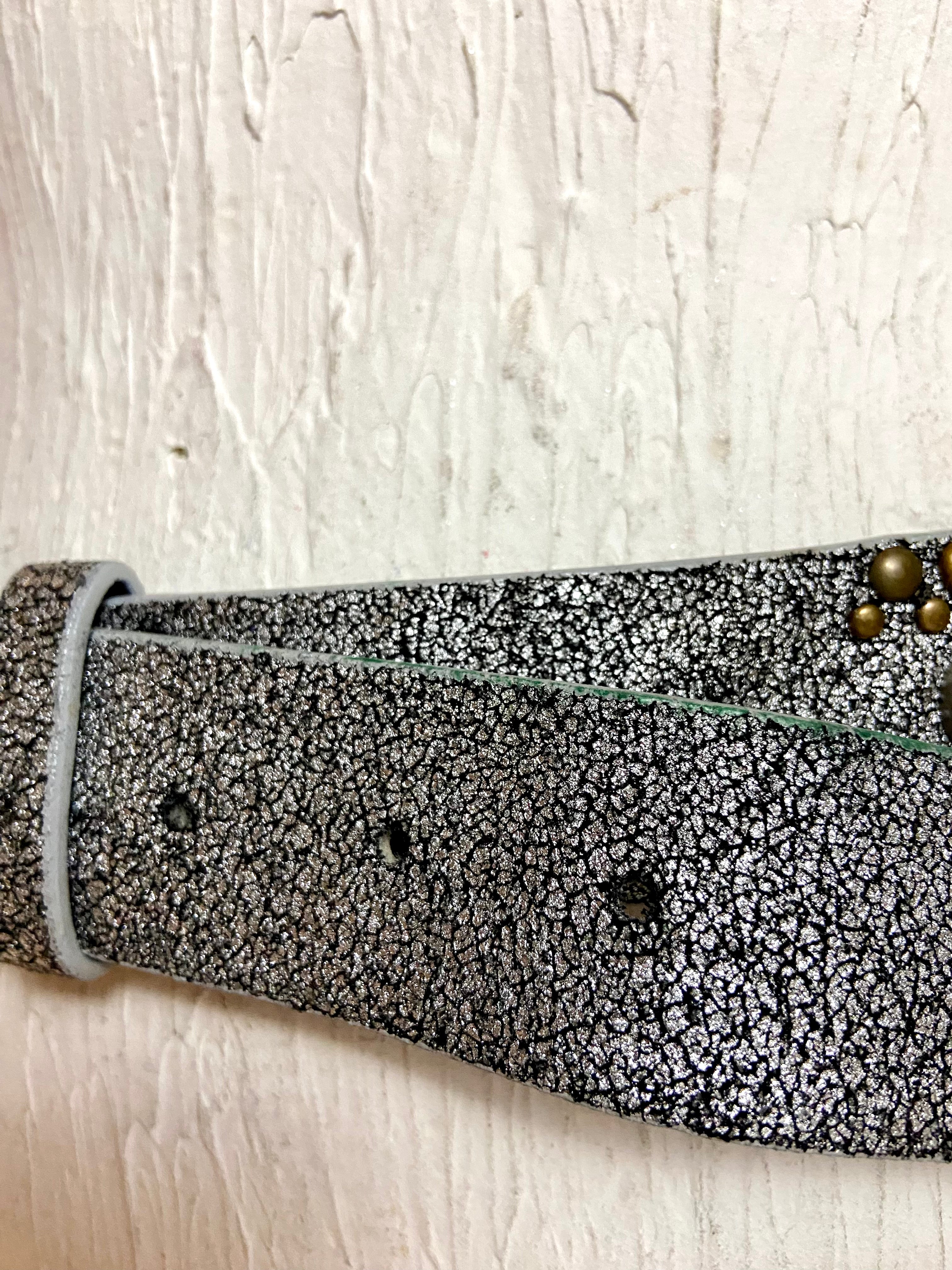 Metallic silver belt