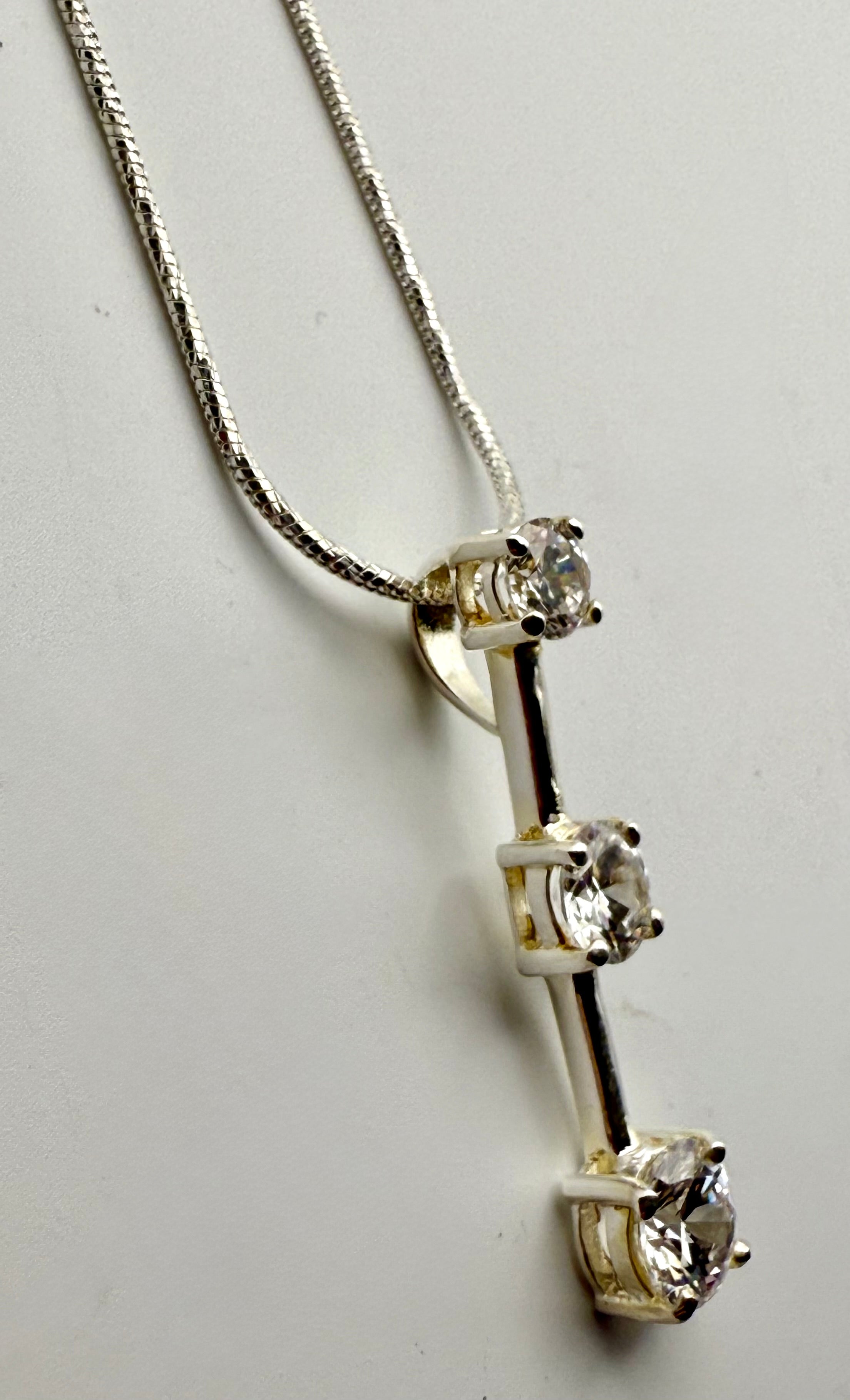 Three
Diamond Pendant necklace