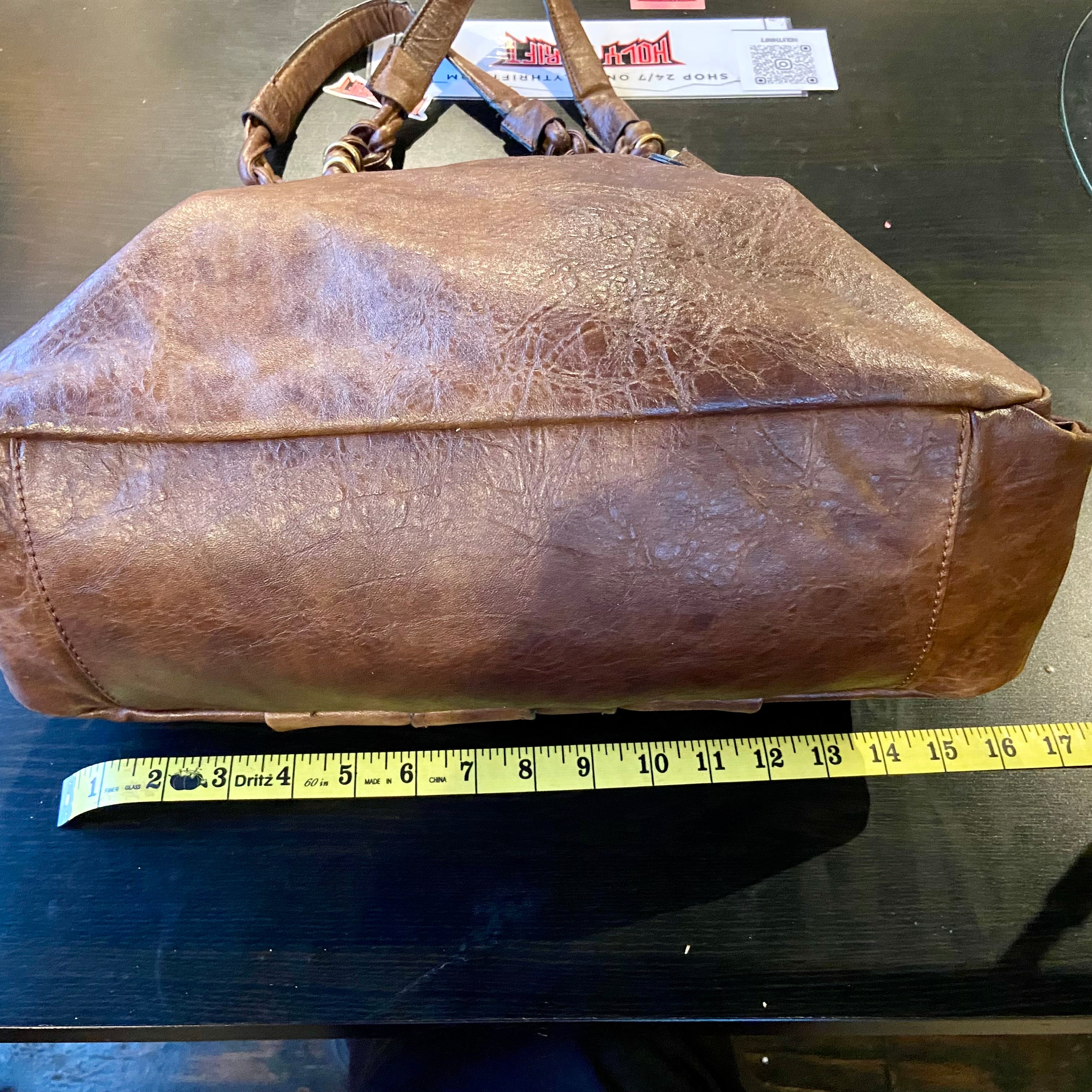 Brown leather hobo bag