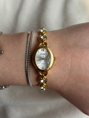 Gold Gem Oval Watch