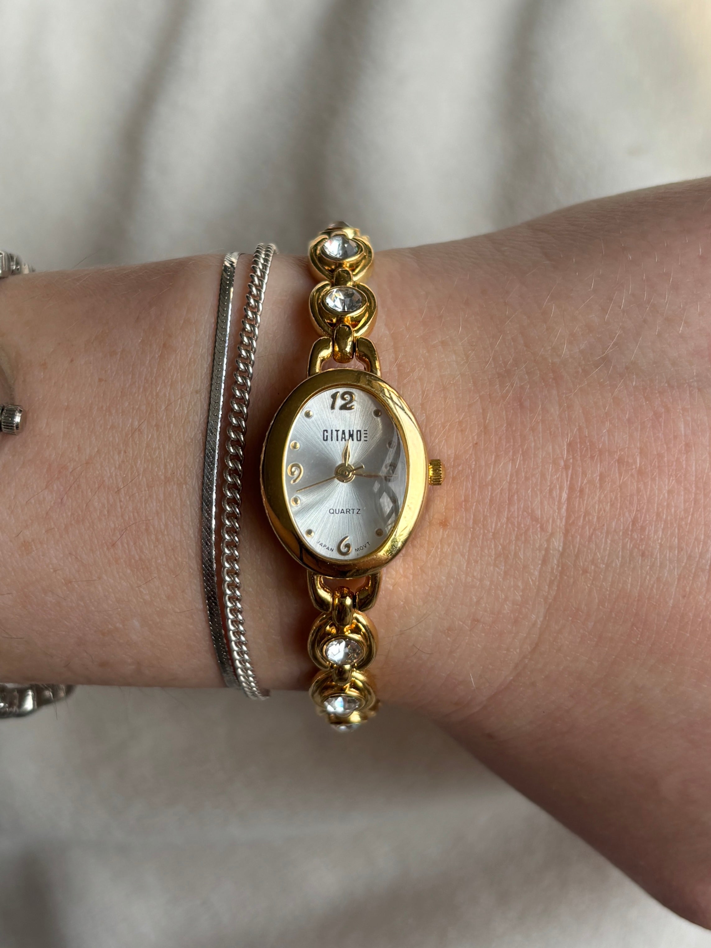 Gold Gem Oval Watch