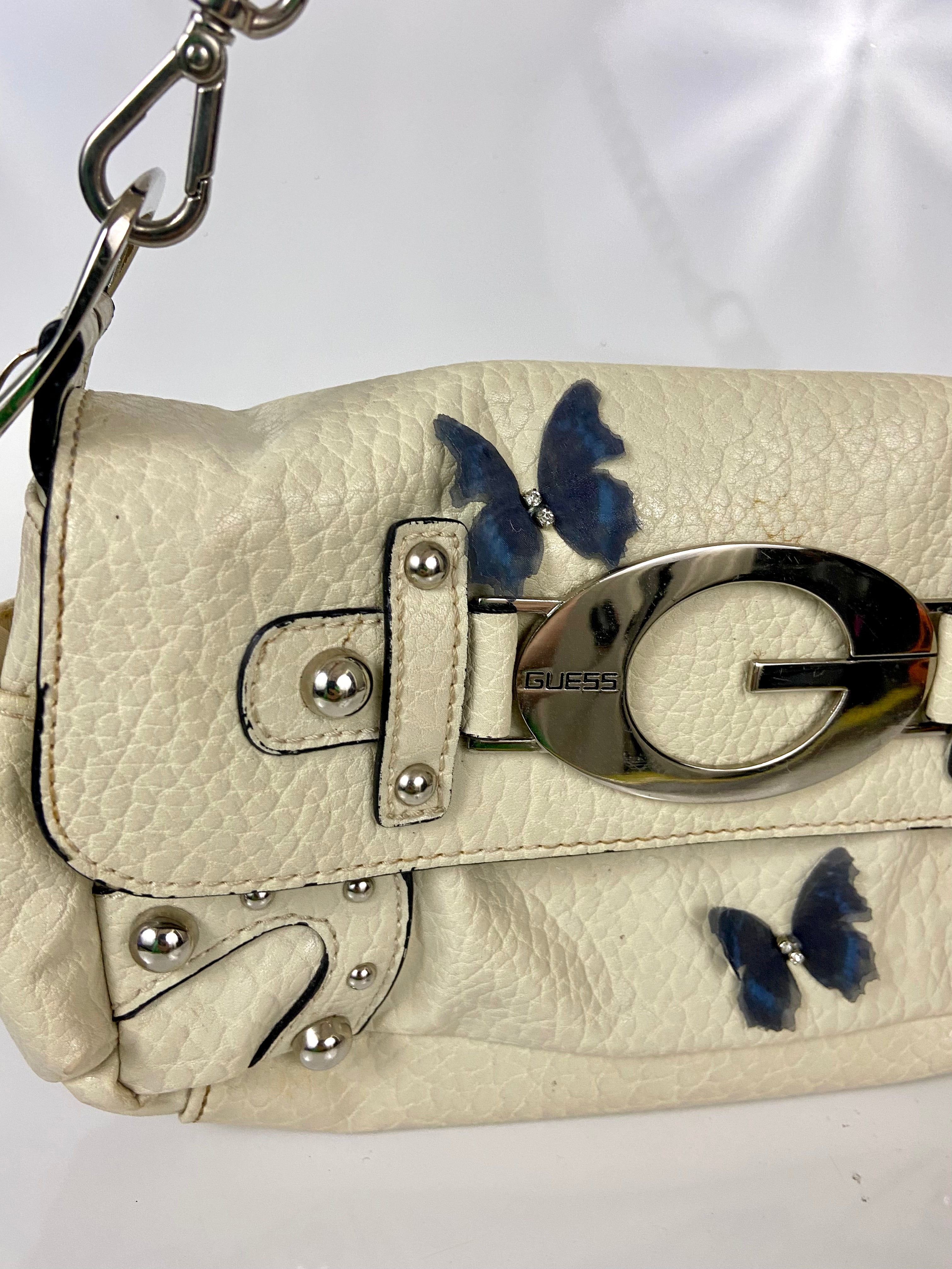 Reworked Vintage Y2k
Guess Studded Shoulder Bag with butterfly 🦋