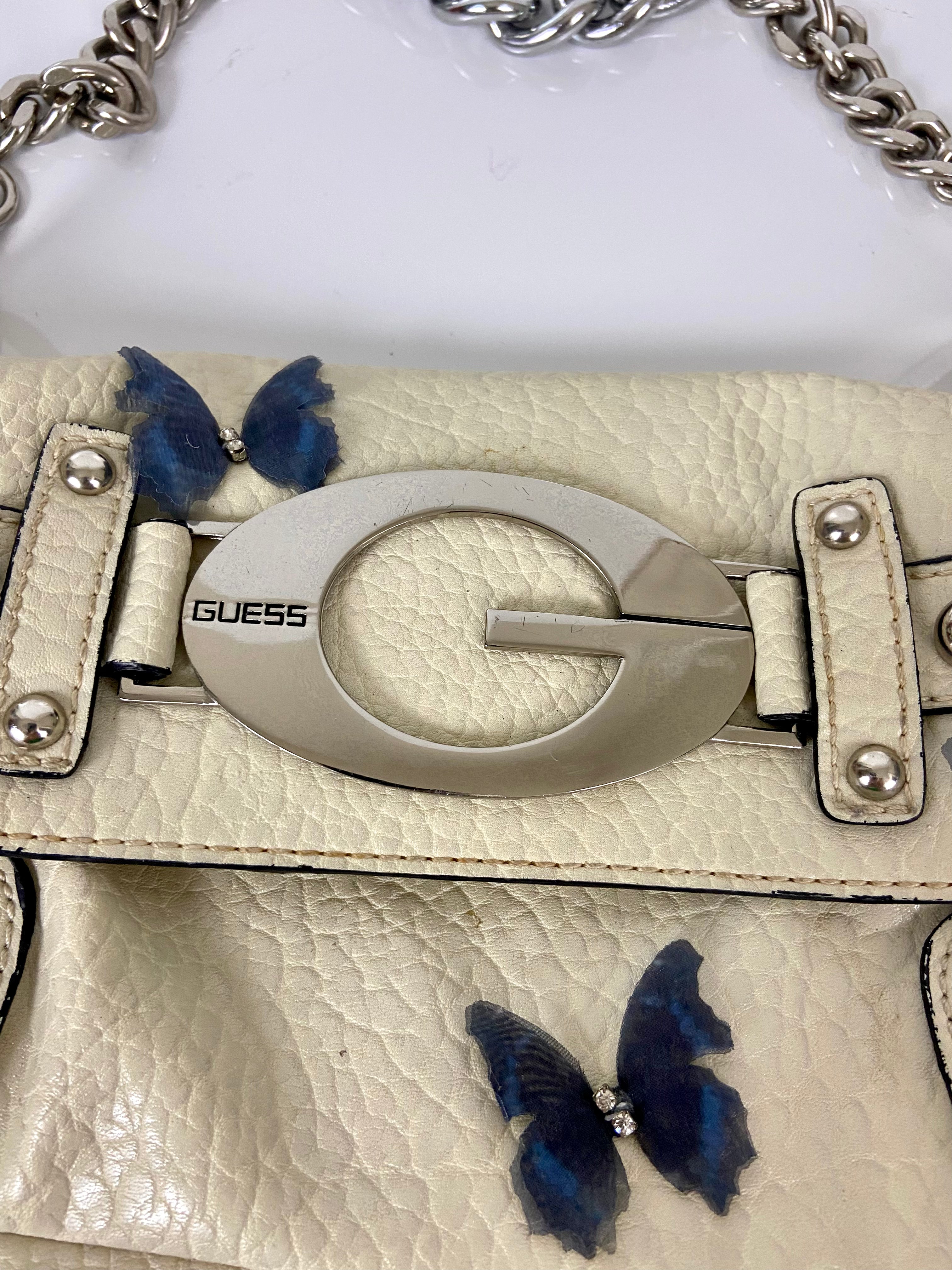 Reworked Vintage Y2k
Guess Studded Shoulder Bag with butterfly 🦋