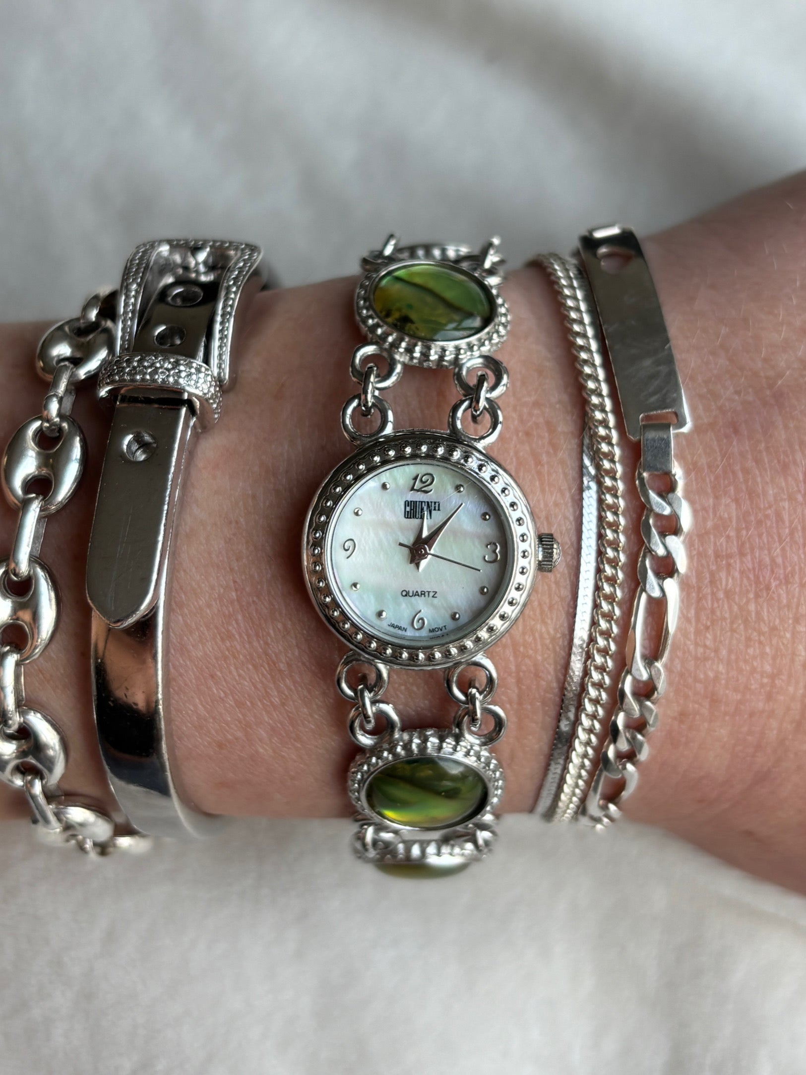 2000s abalone & pearl watch