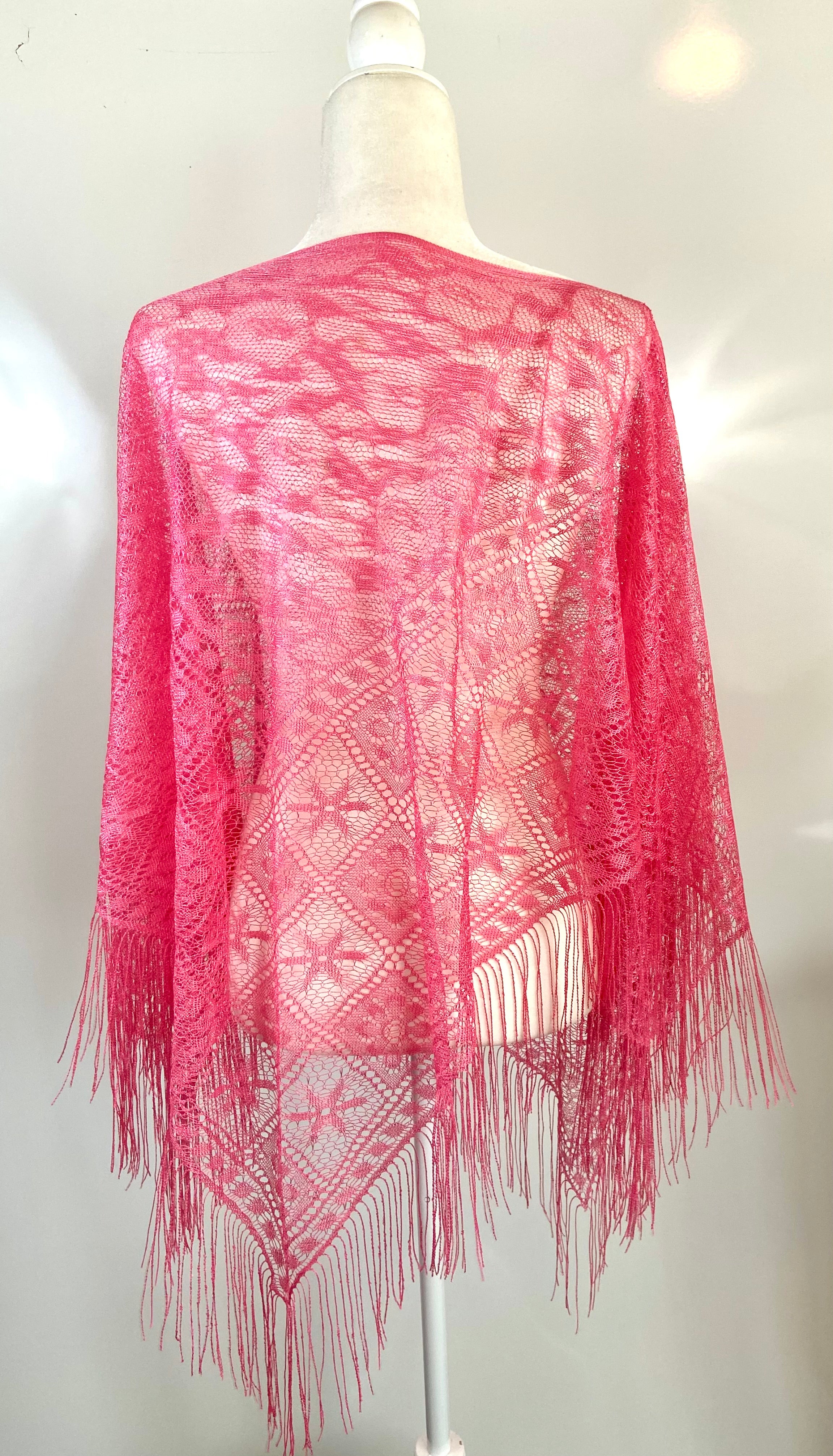Hot pink poncho with flower accessories