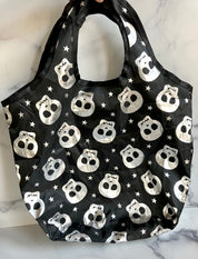 Silver and black skull bag