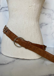 Brown leather belt with metal circle