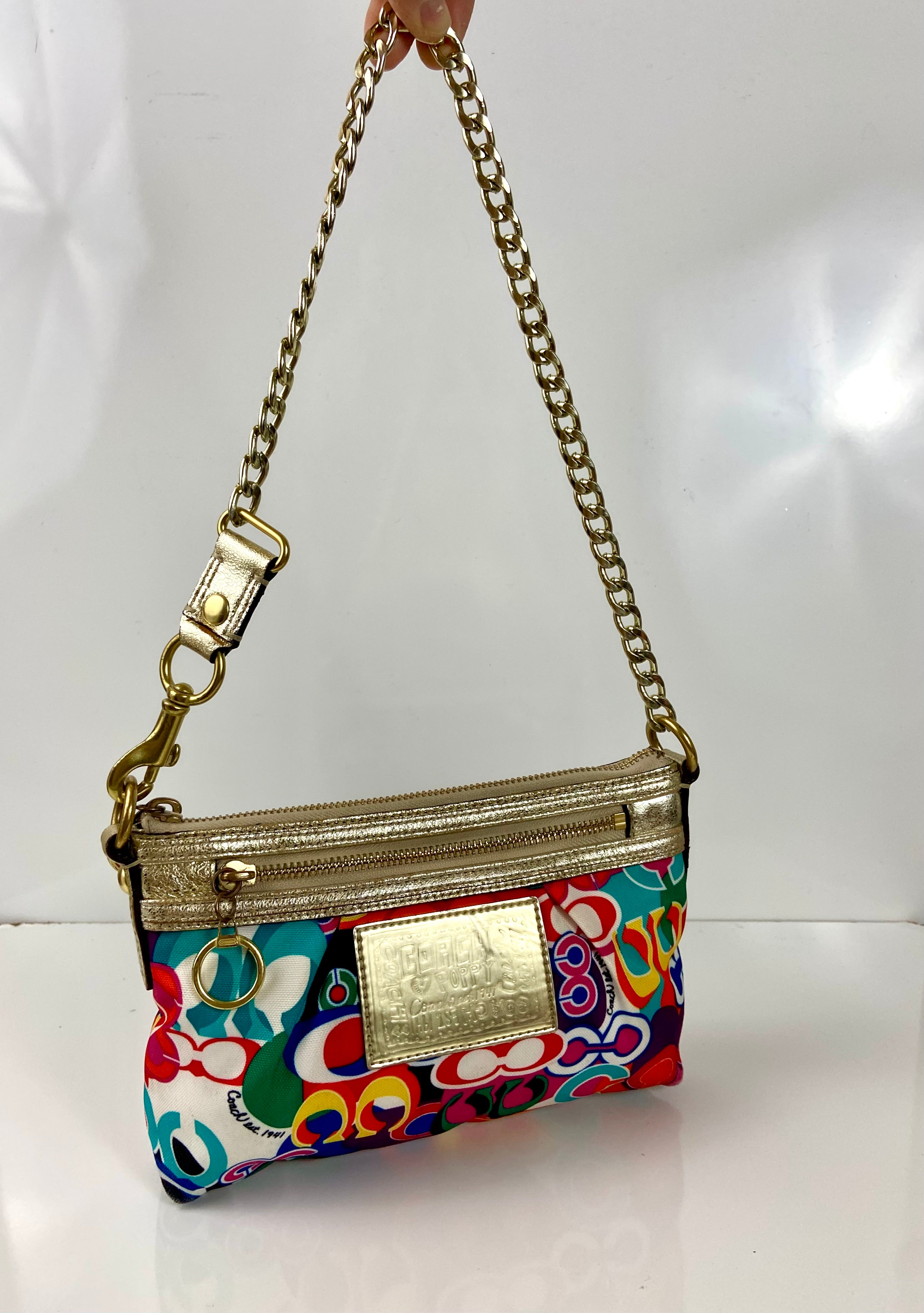 Coach with reworked gold metal handles