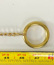 Vintage brass piece in a belt