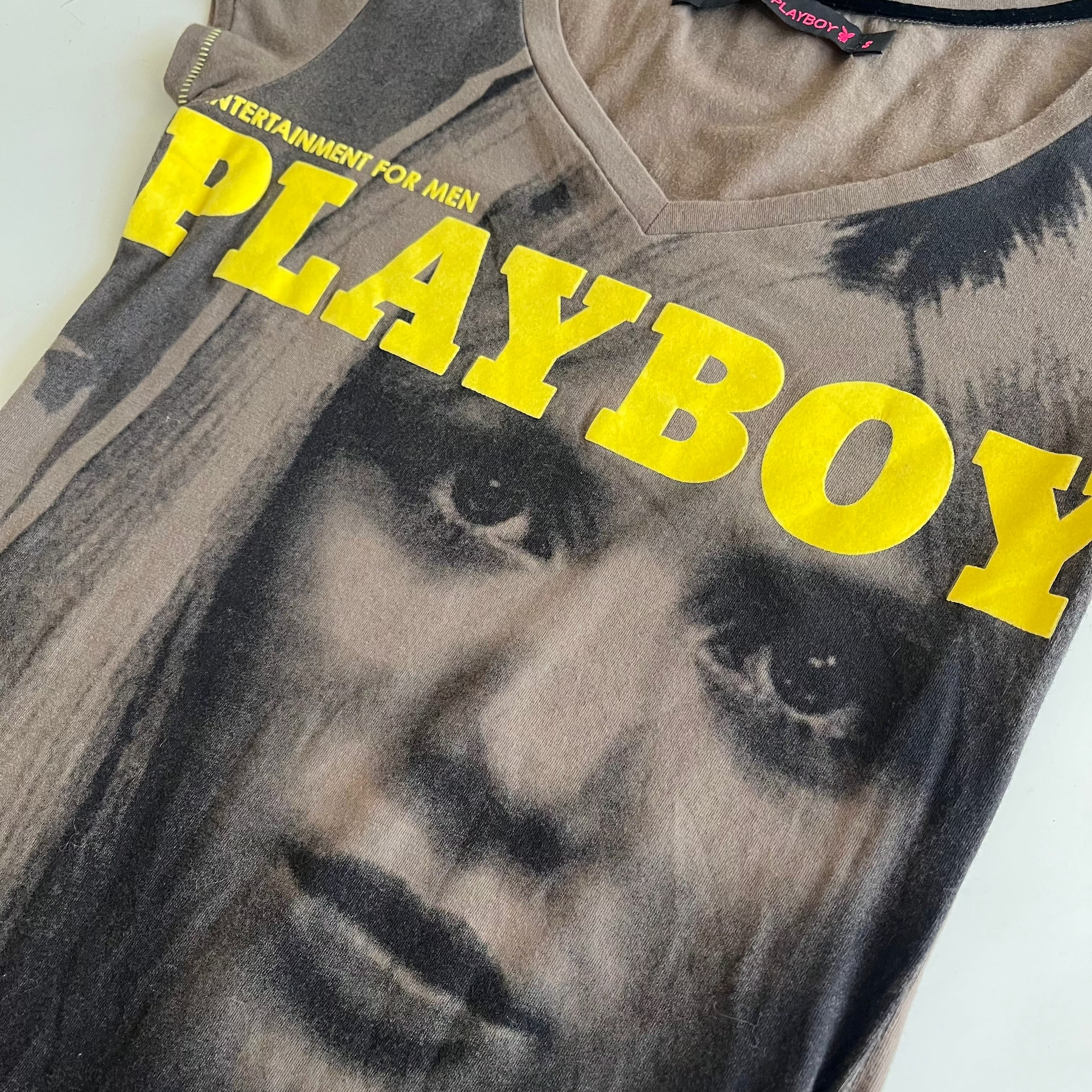 Gray t-shirt with a graphic of a dog and 'Playboy' text in yellow on a white background