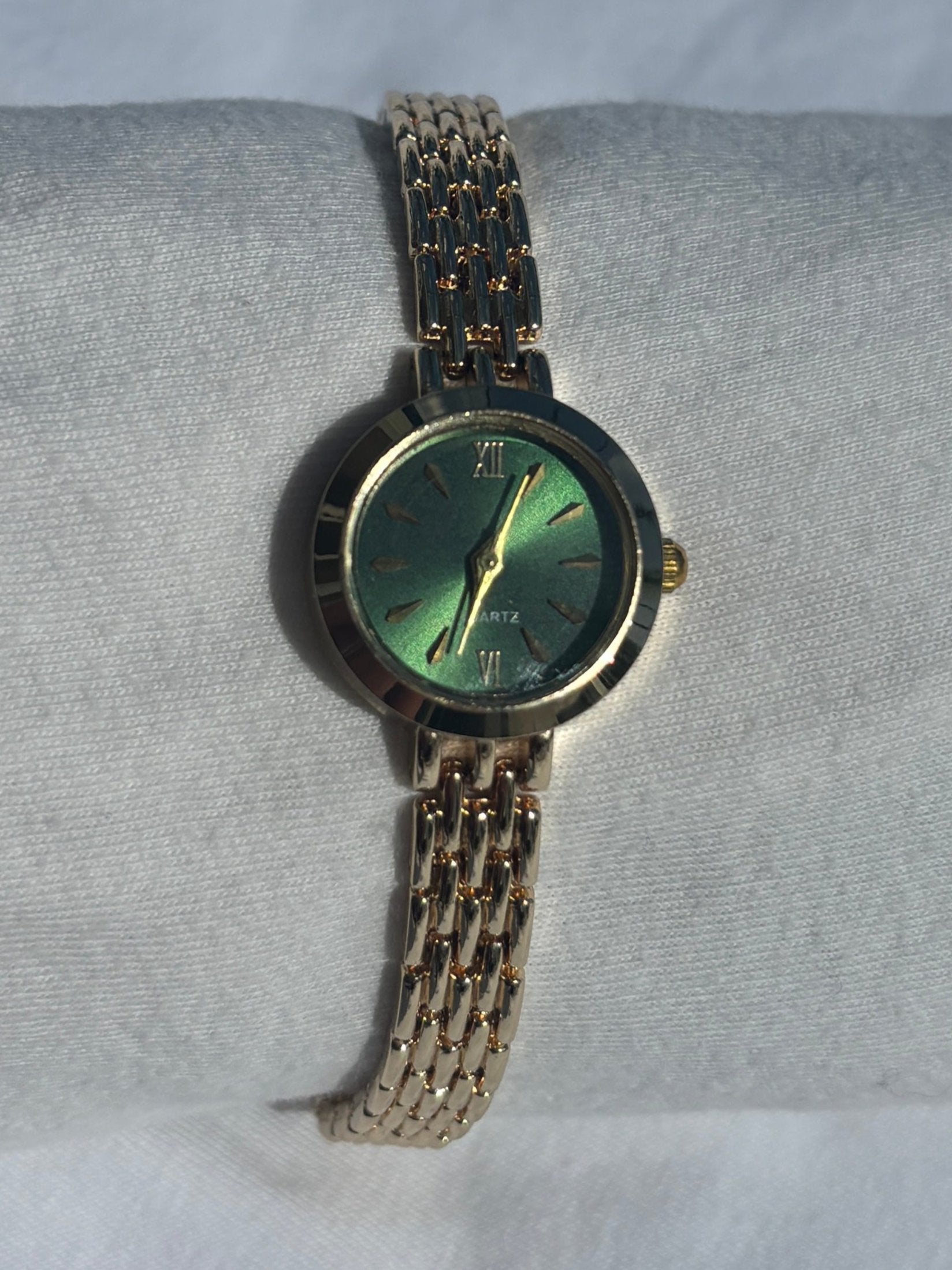 dainty 2000s forest green & gold watch