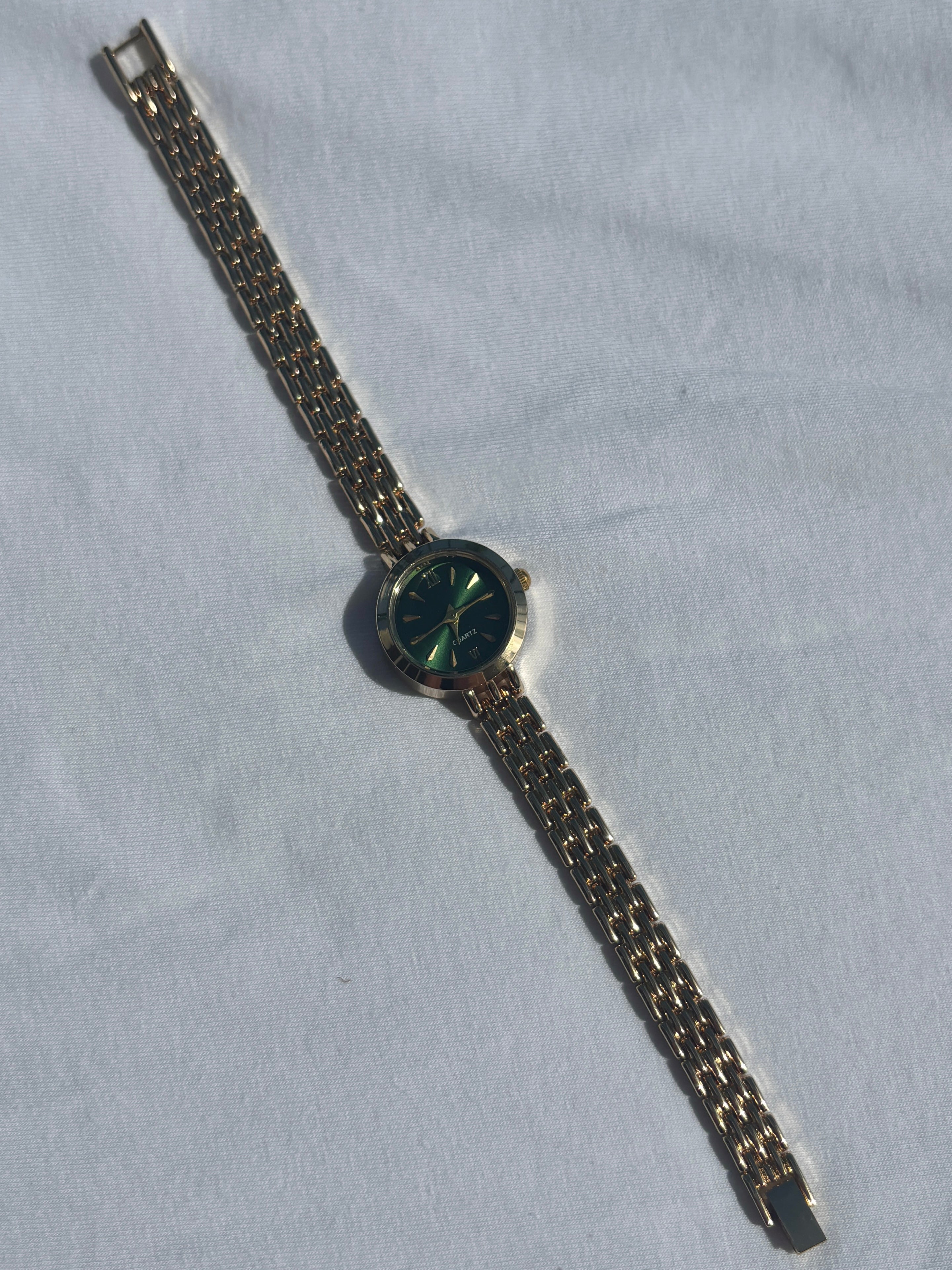 dainty 2000s forest green & gold watch