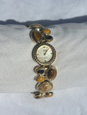 2000s golden stone & pearl watch