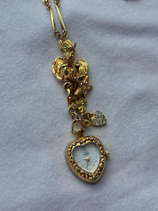 angel bby Kirks Folly heart-watch necklace