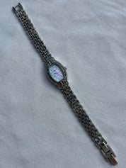 black crystal watch with cotton candy mother of pearl dial