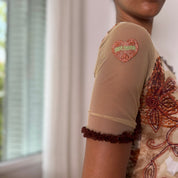 Shirt Passion Italian vintage Y2K cream & brown asymmetrical mesh top with embroidered floral appliqués, leopard print back & one shoulder detail