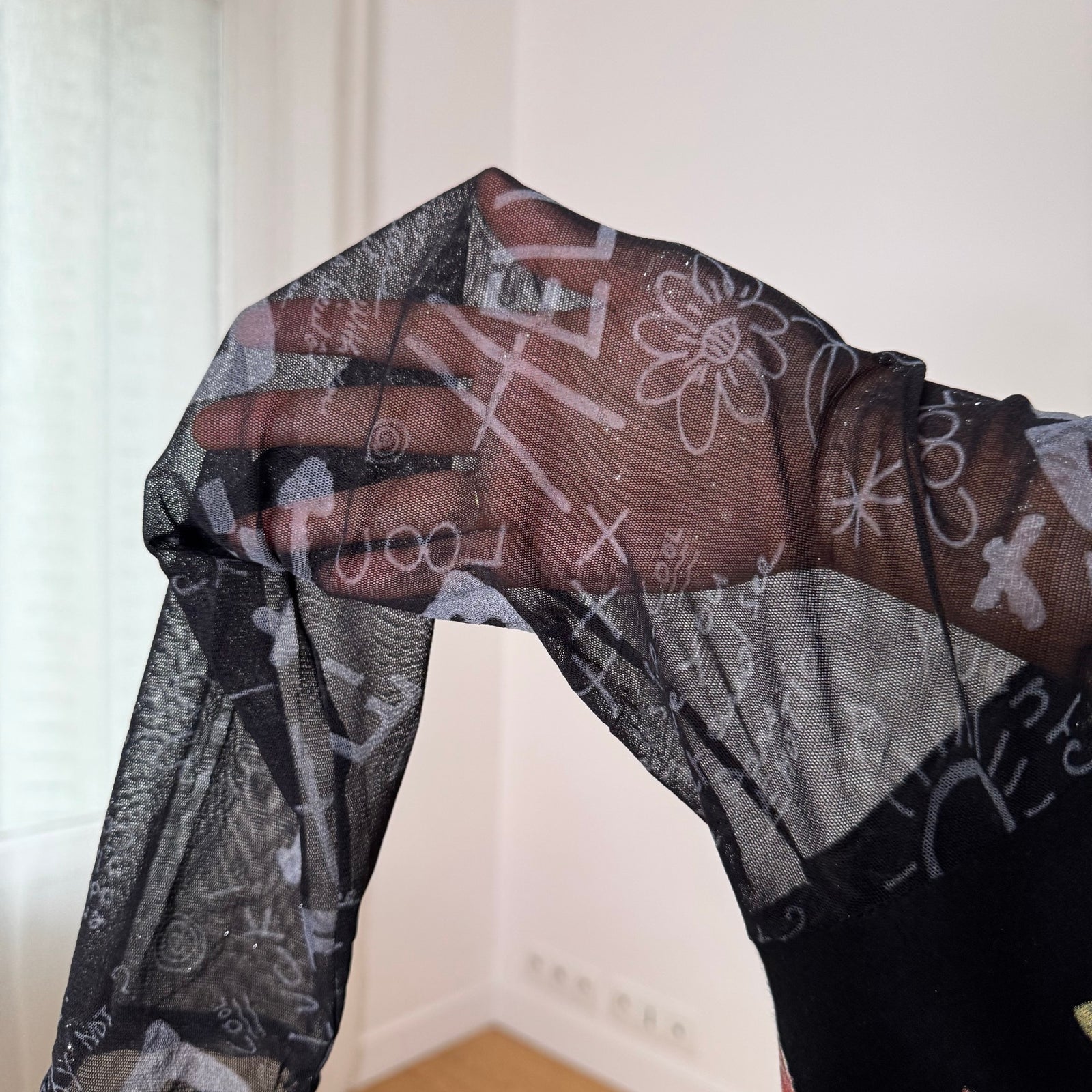 Misia Paris French vintage Y2K black illustrated graphic top with French poetry print & sheer doodle mesh sleeves