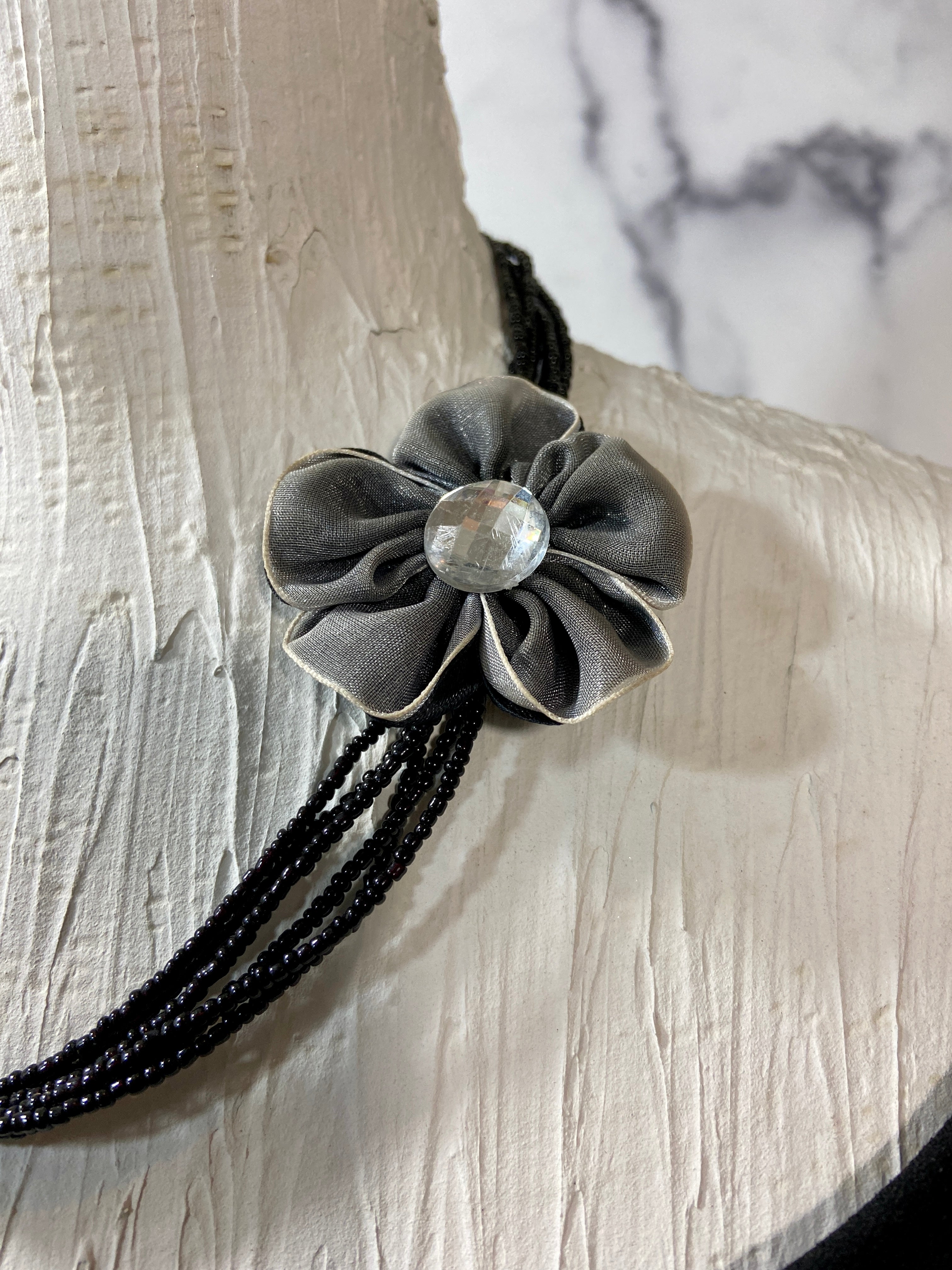 Flower in a layered beads