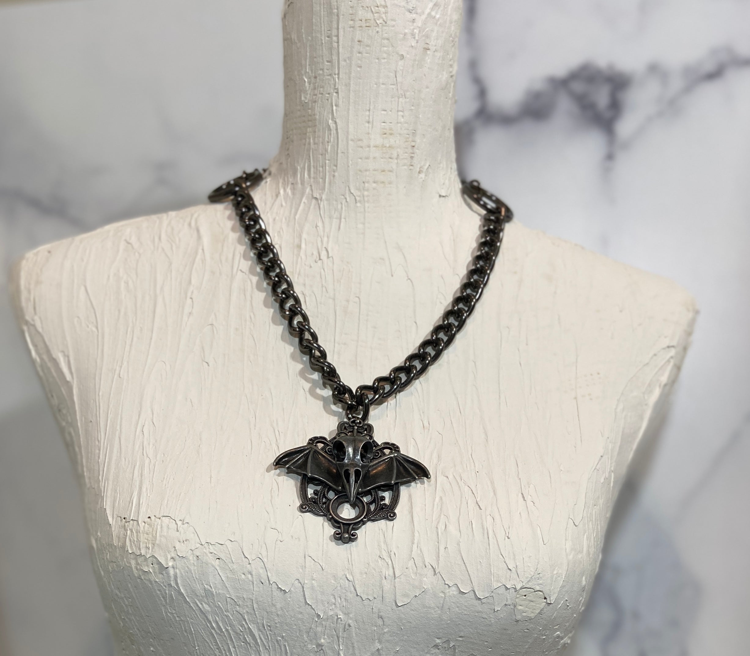 Skull and Bat Wing Pendant