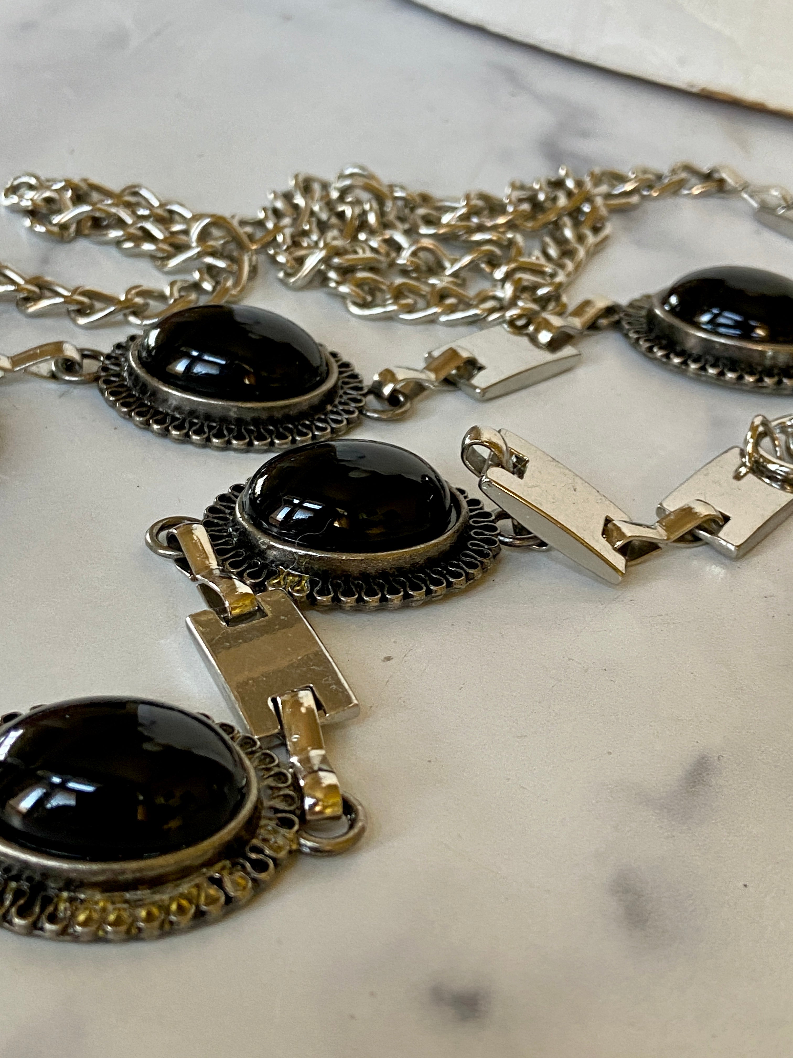 Black and vintage silver belt